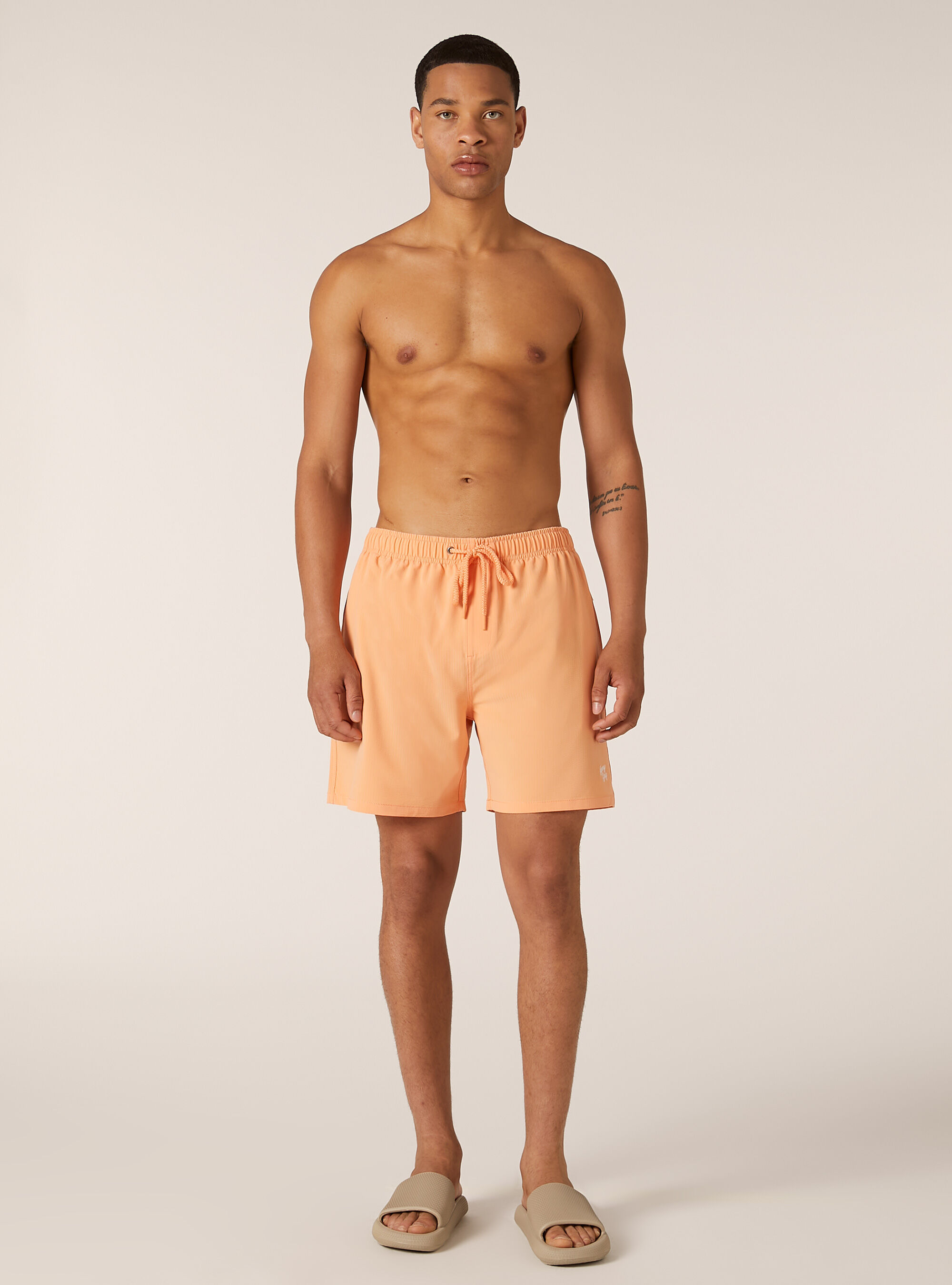 Plain-coloured seersucker swimming costume