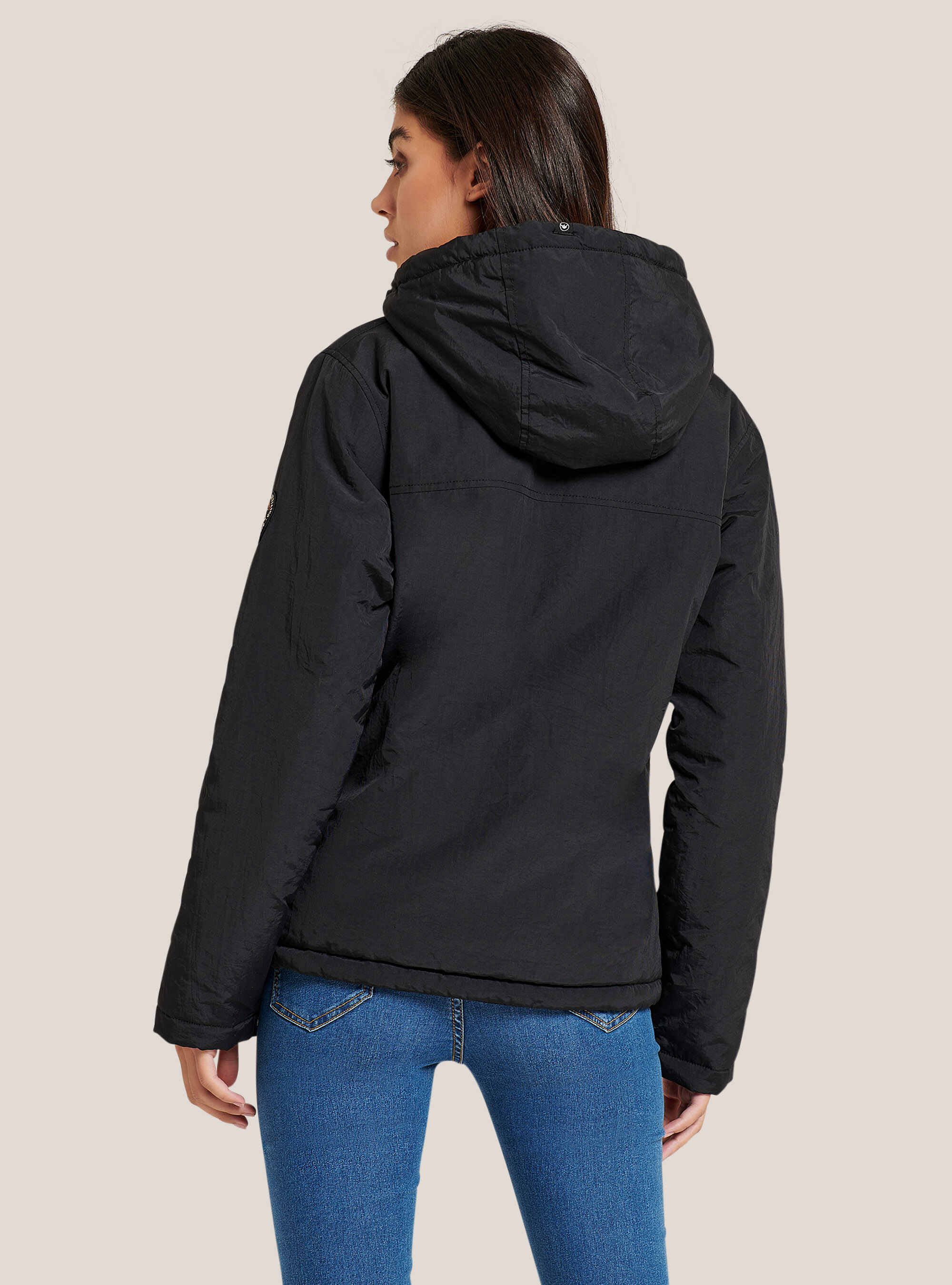 Anorak jacket with front flap with patch and hood