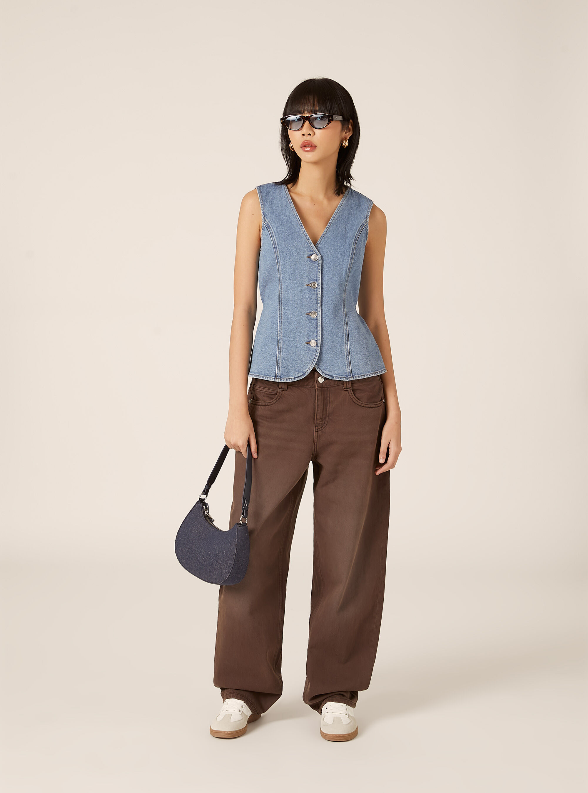 Gilet in denim con bottoni