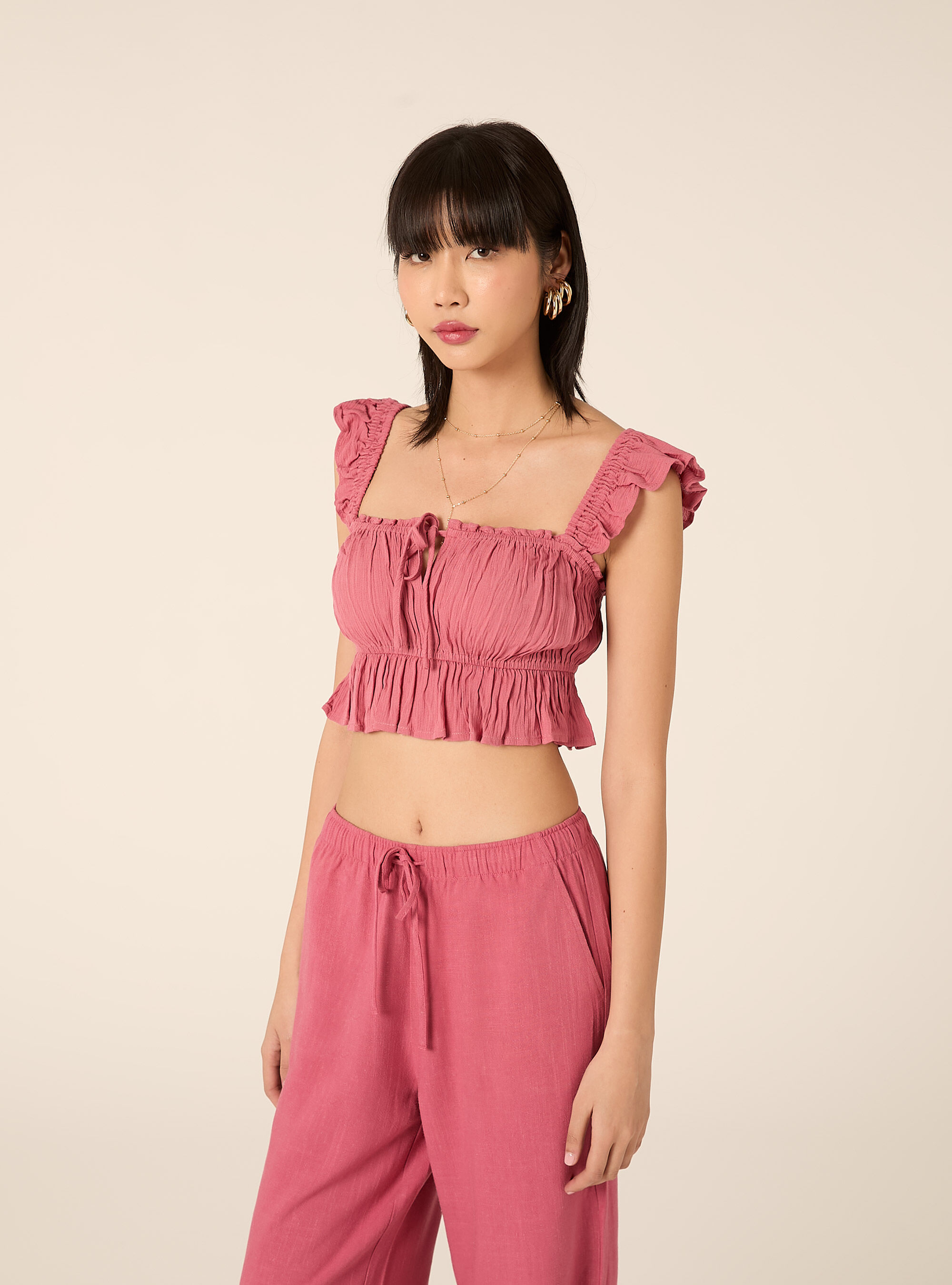 Top in crepe con volant