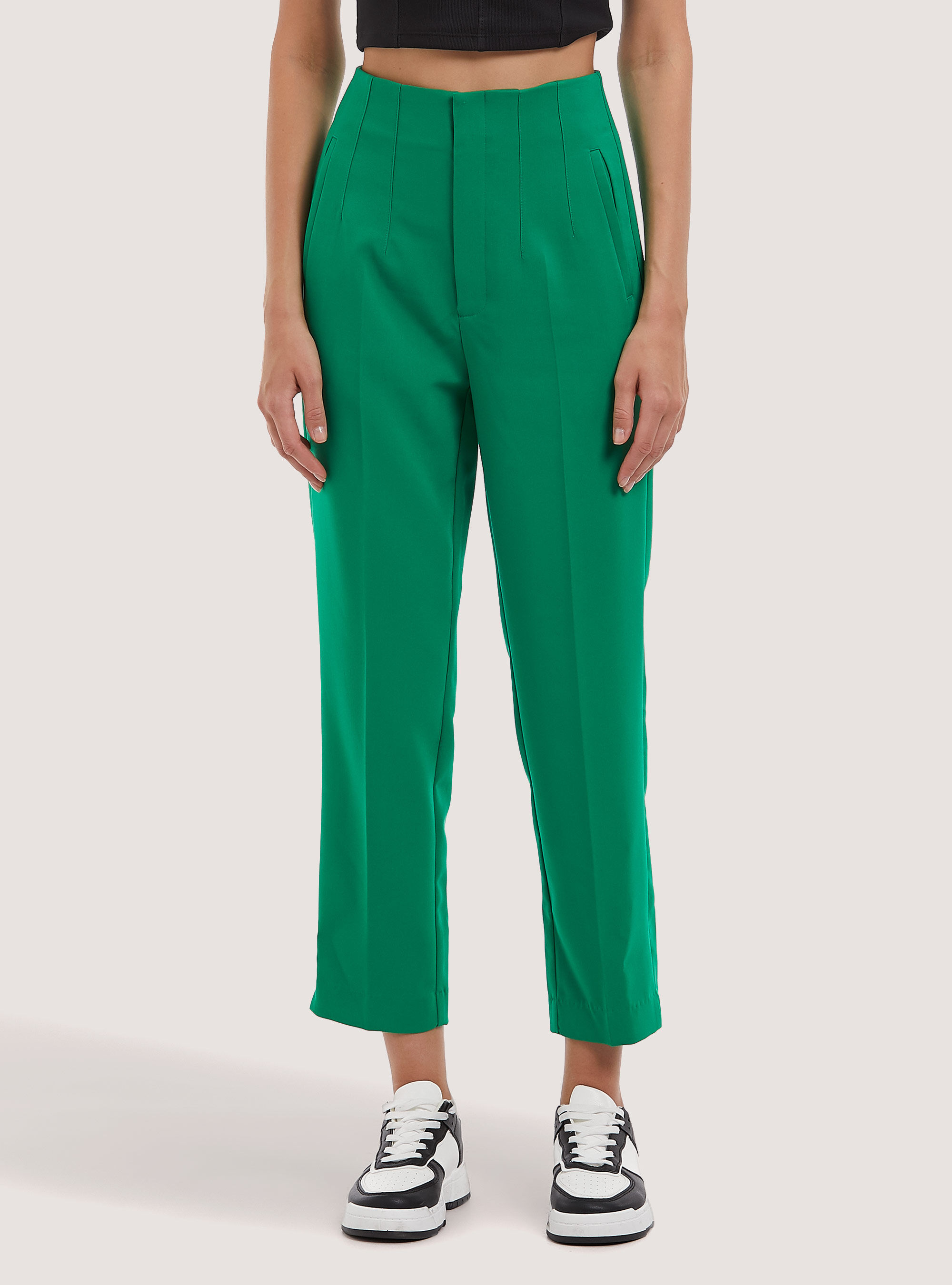 Plain coloured trousers with darts