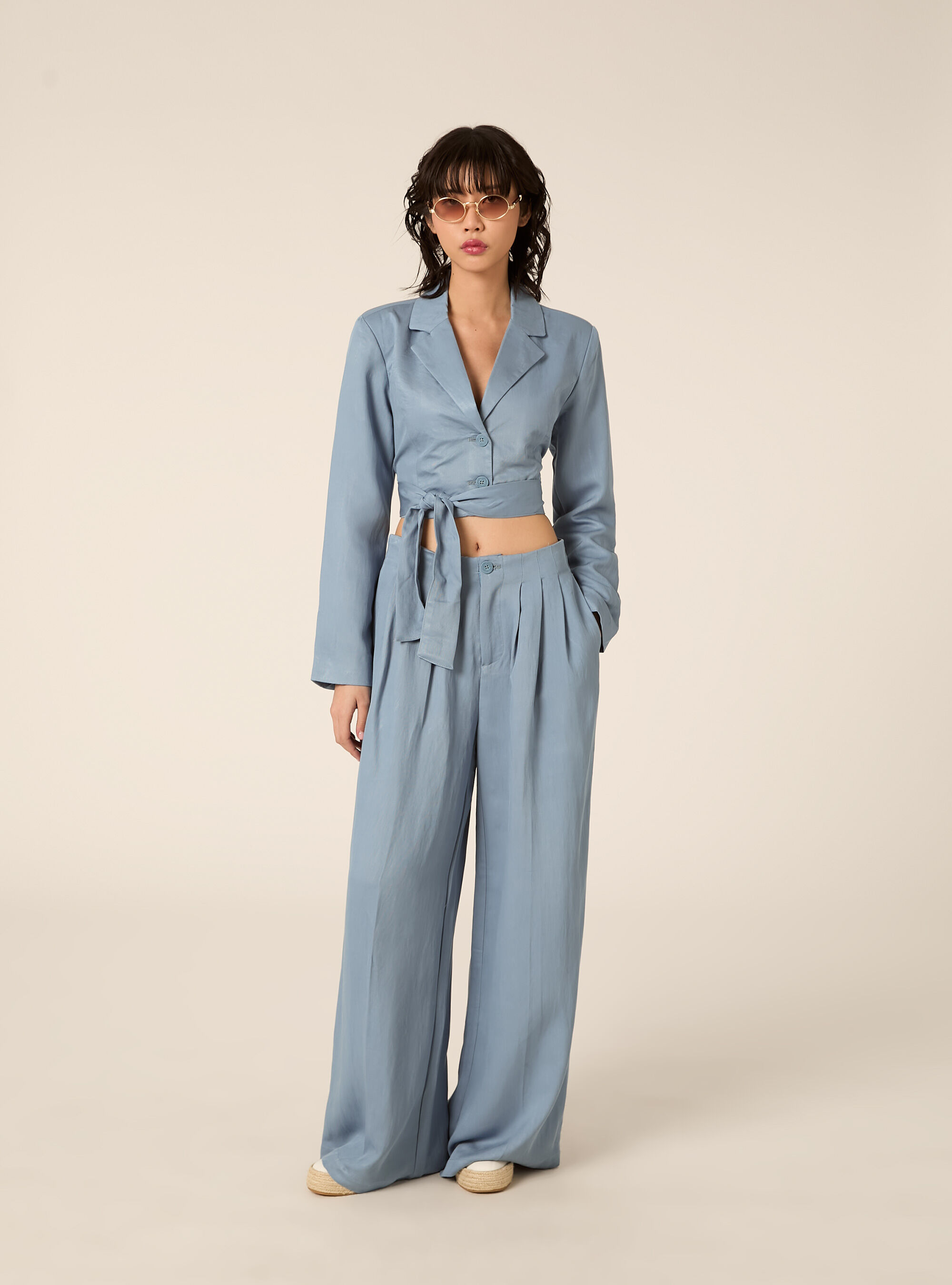 Pantaloni wide leg con pence