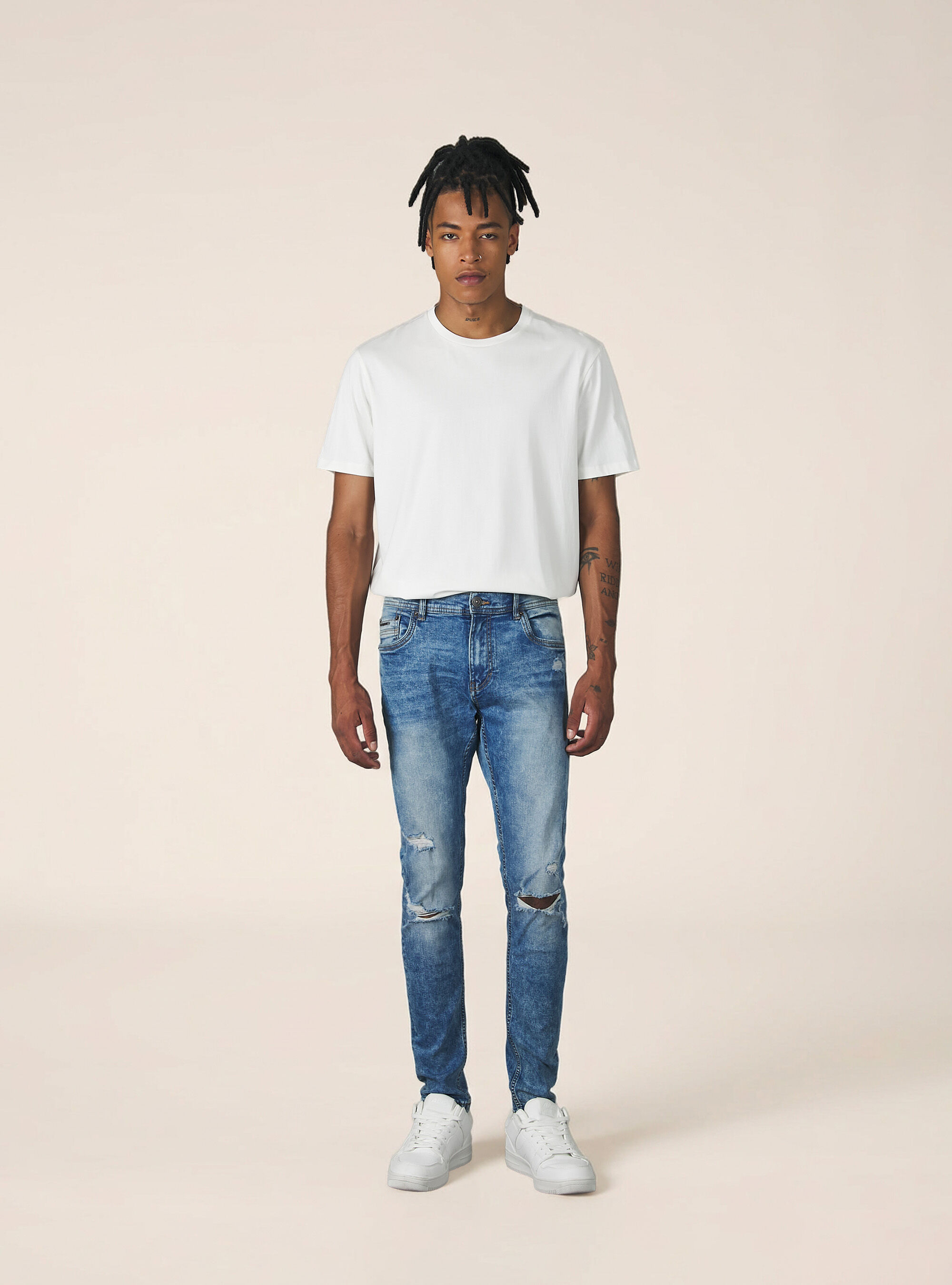 Super skinny jeans with breaks in stretch denim