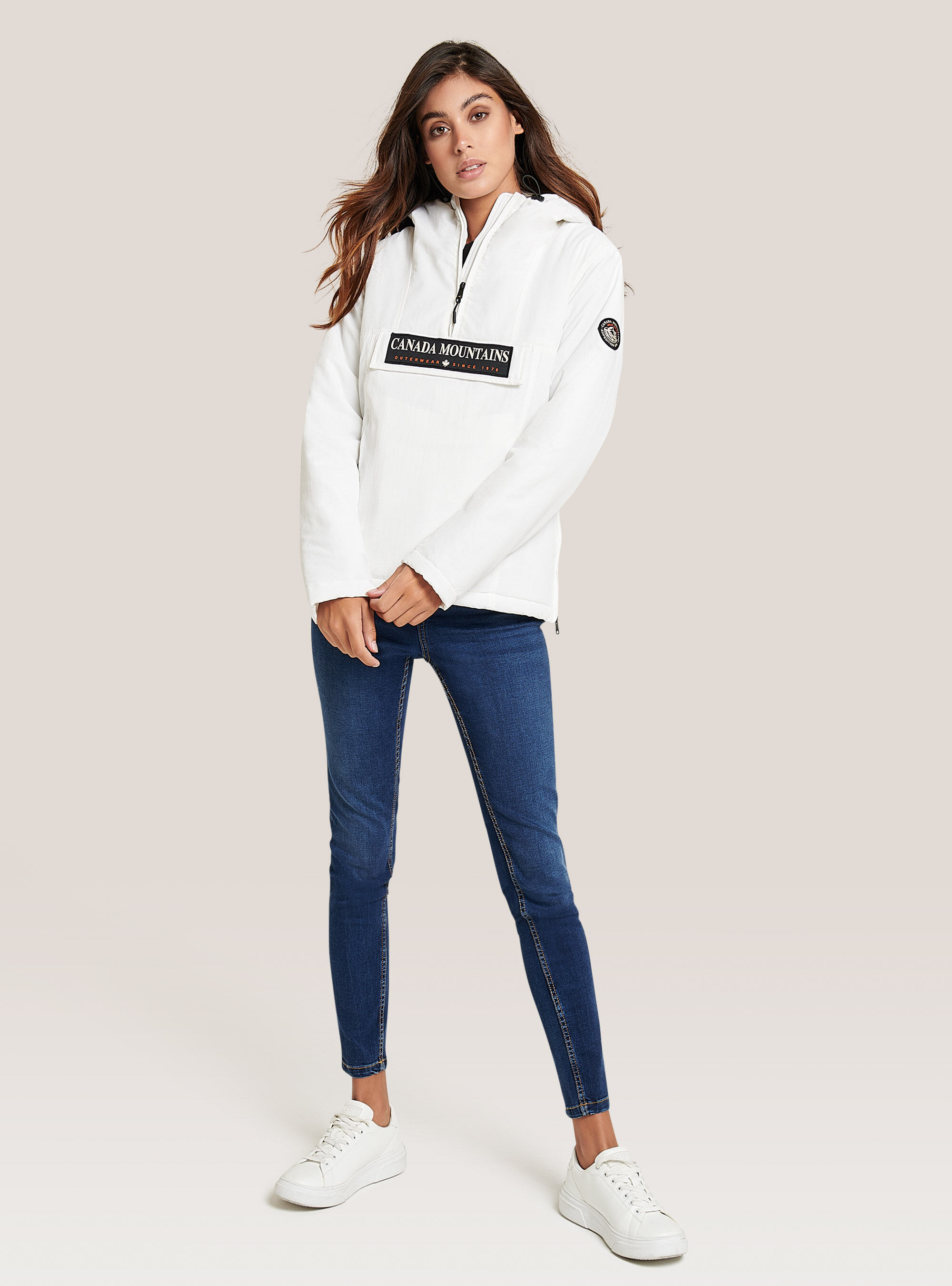 Anorak jacket with front flap with patch and hood