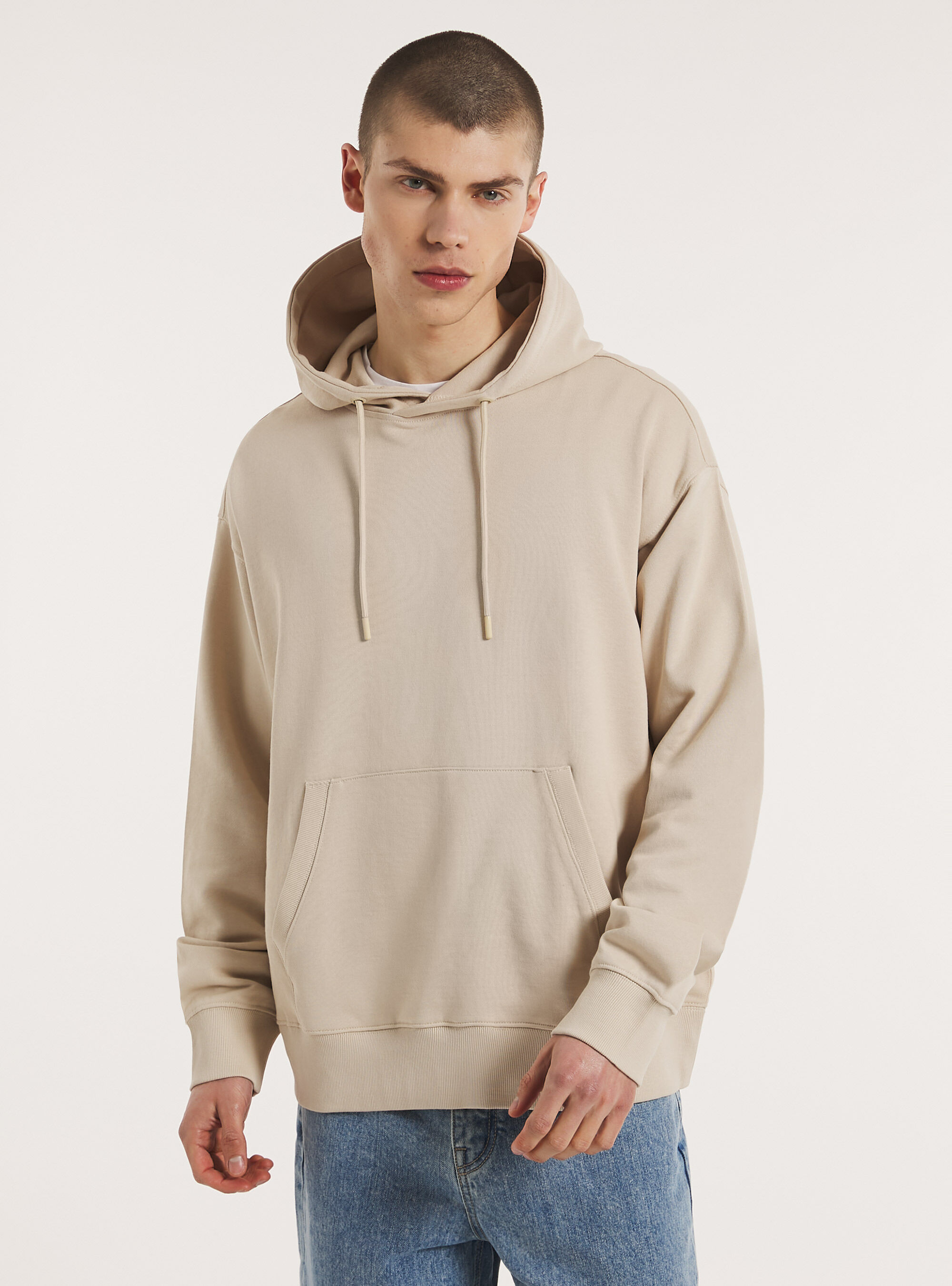 Hooded jacket with pouch pocket on sale