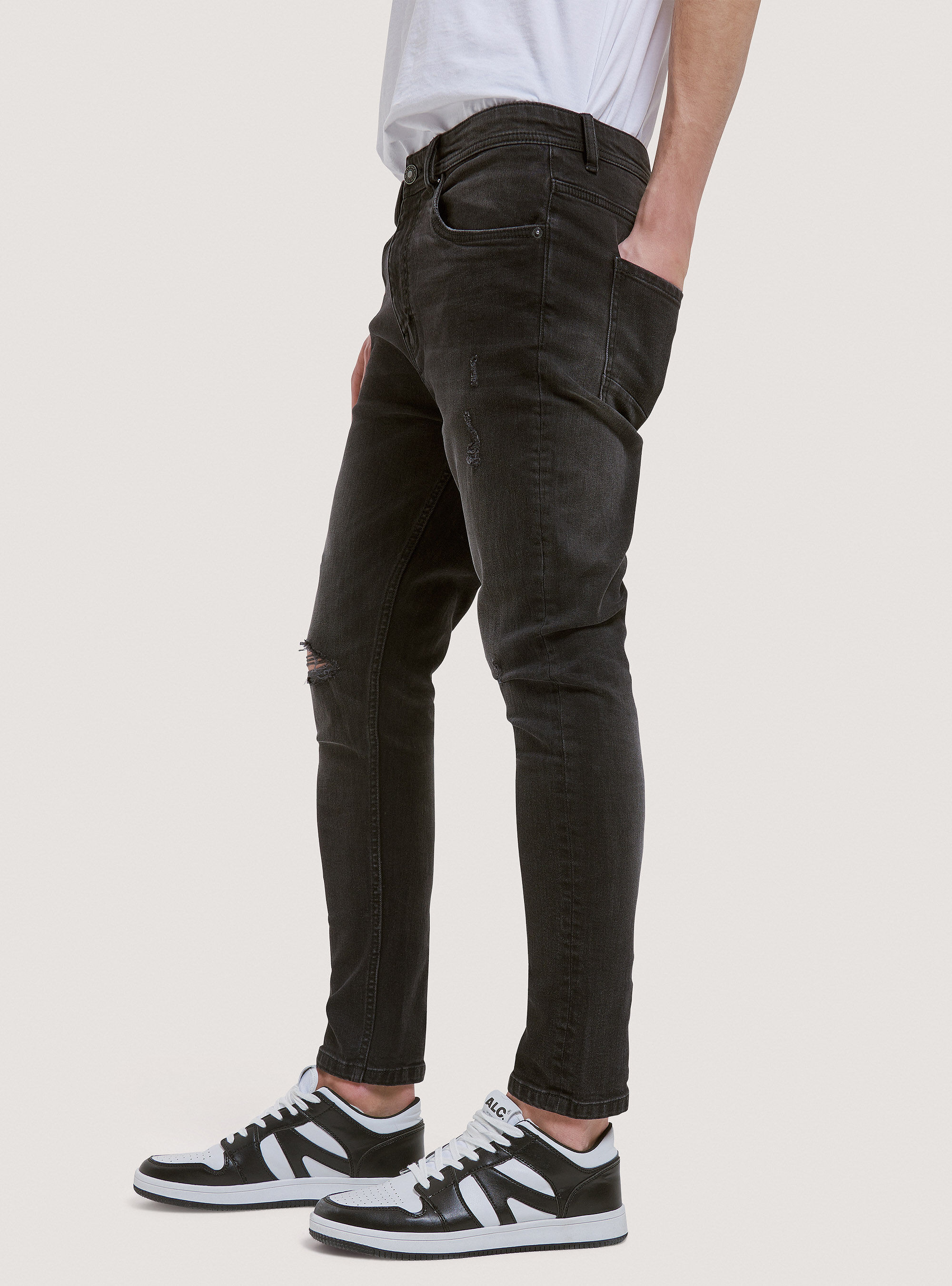 Jeans coupe carotte en denim stretch