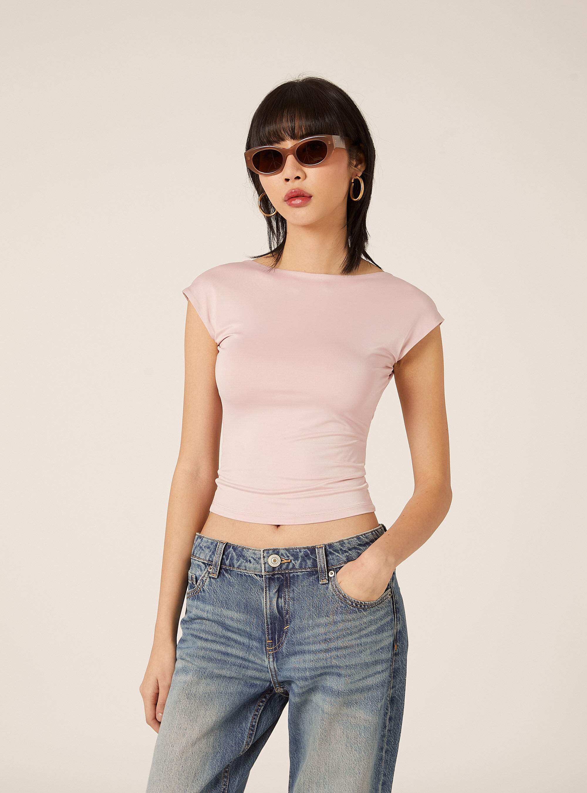 Maglietta con schiena scoperta