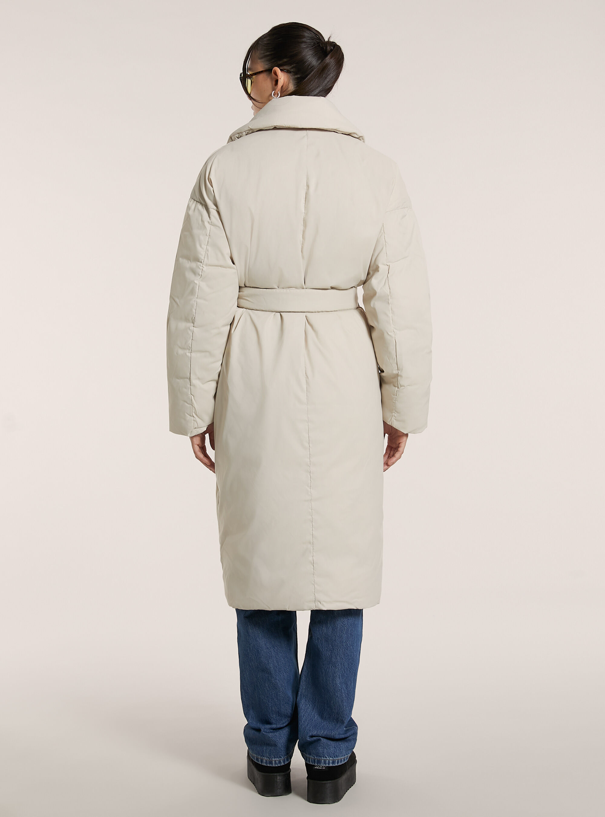 Belted trench coat with recycled padding