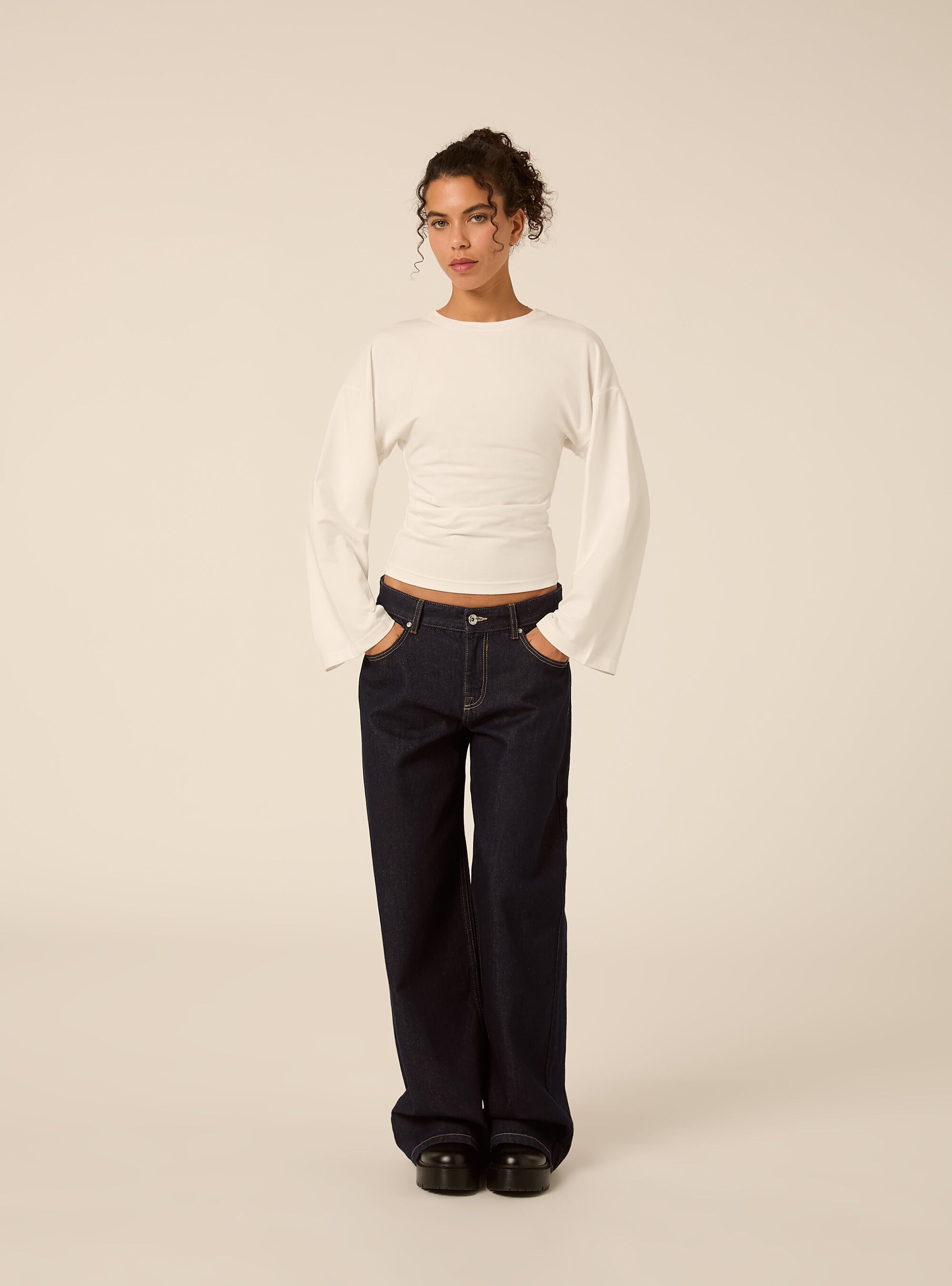Flare sleeve top with side ruched detailing