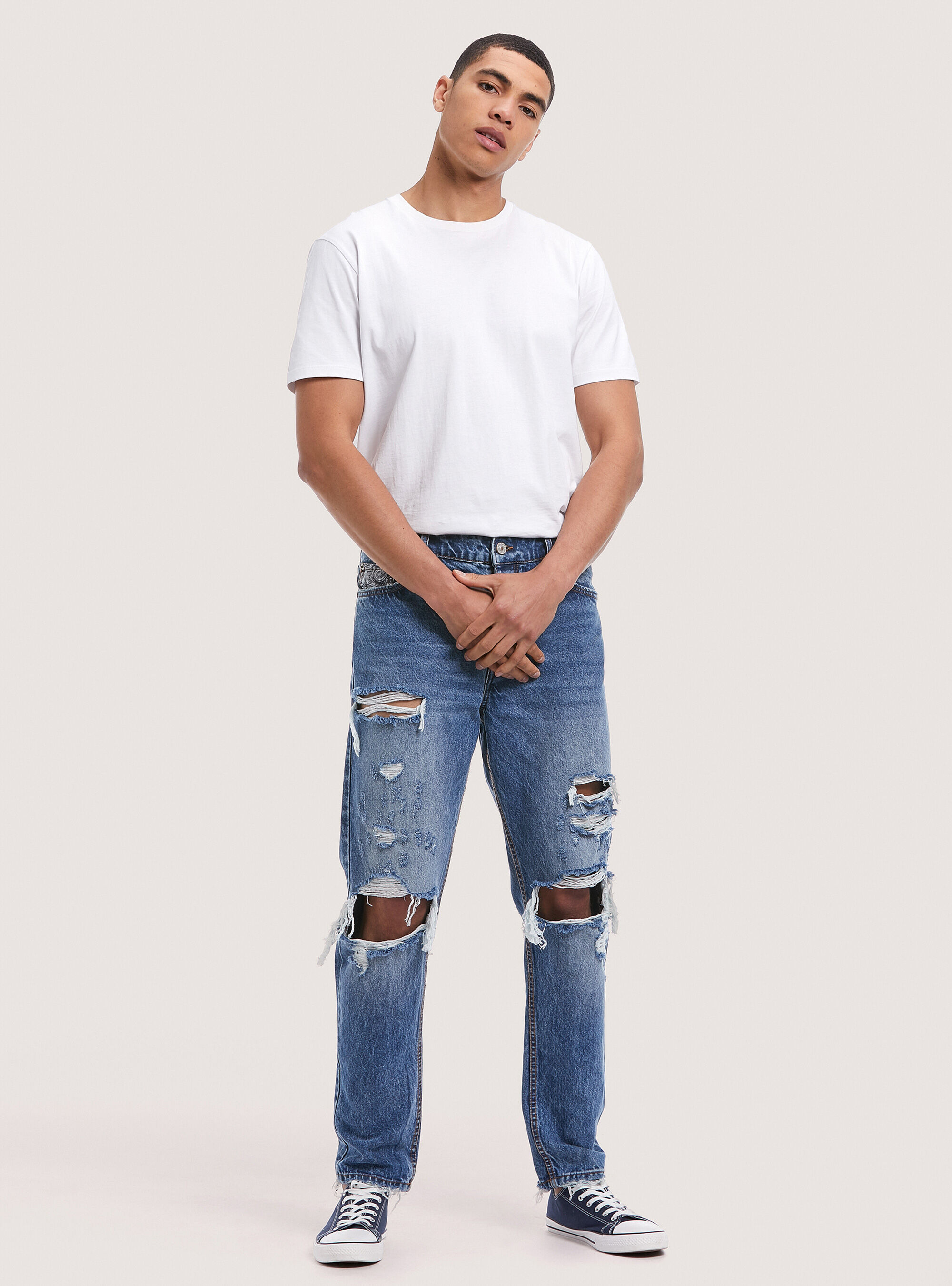Jeans straight fit in cotone con rotture | Alcott | Nuova Collezione Uomo