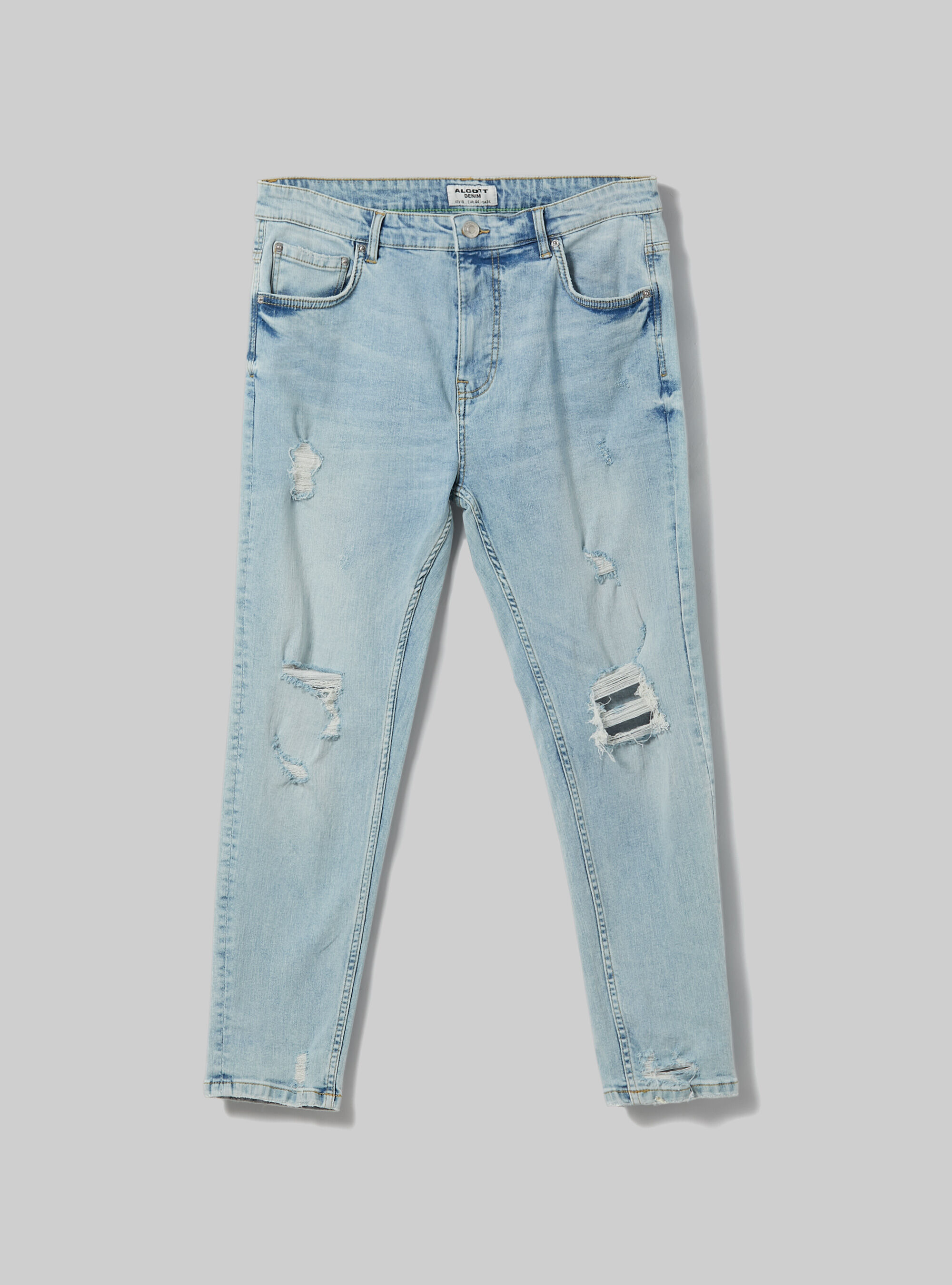 Ripped carrot fit jeans shop