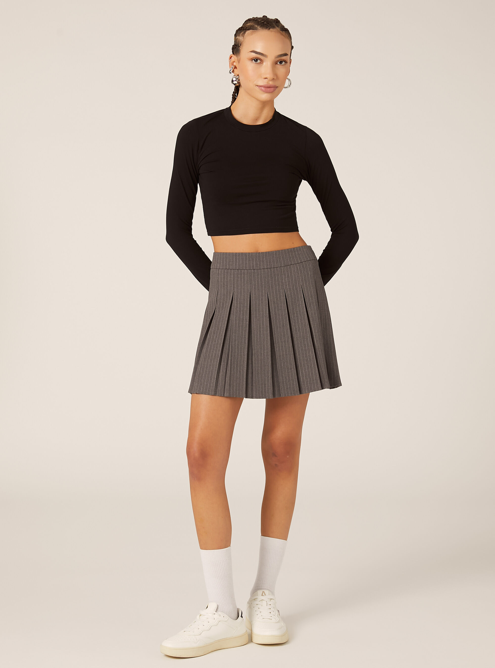 Patterned pleated miniskirt