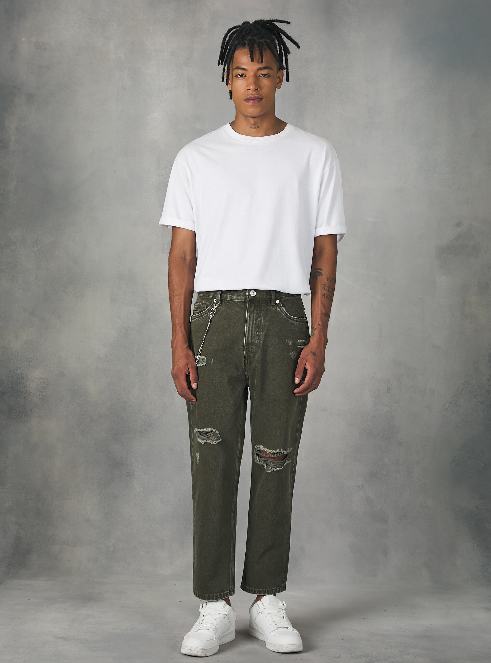 Jeans with chain rips top