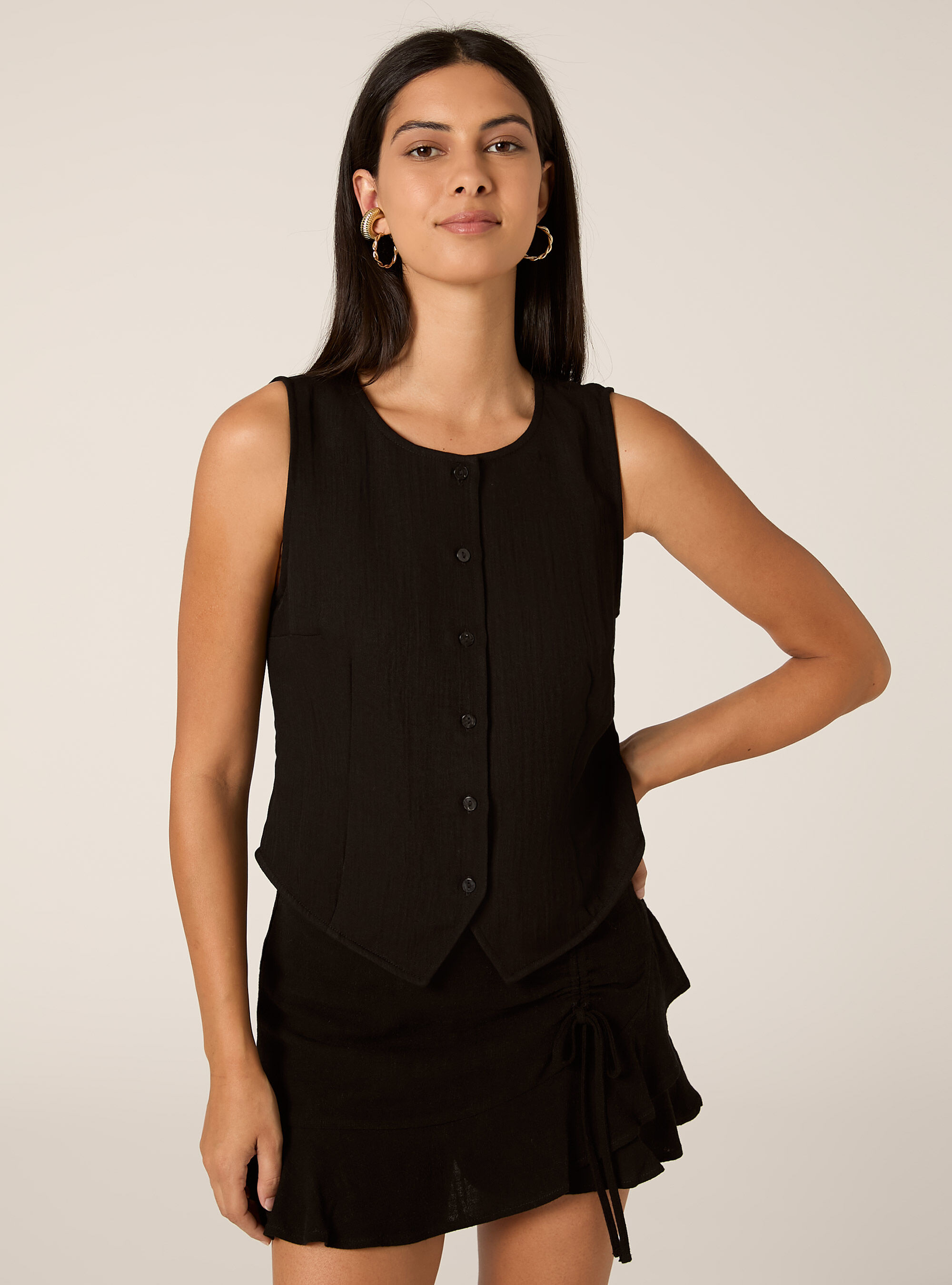 Gilet con texture e bottoni