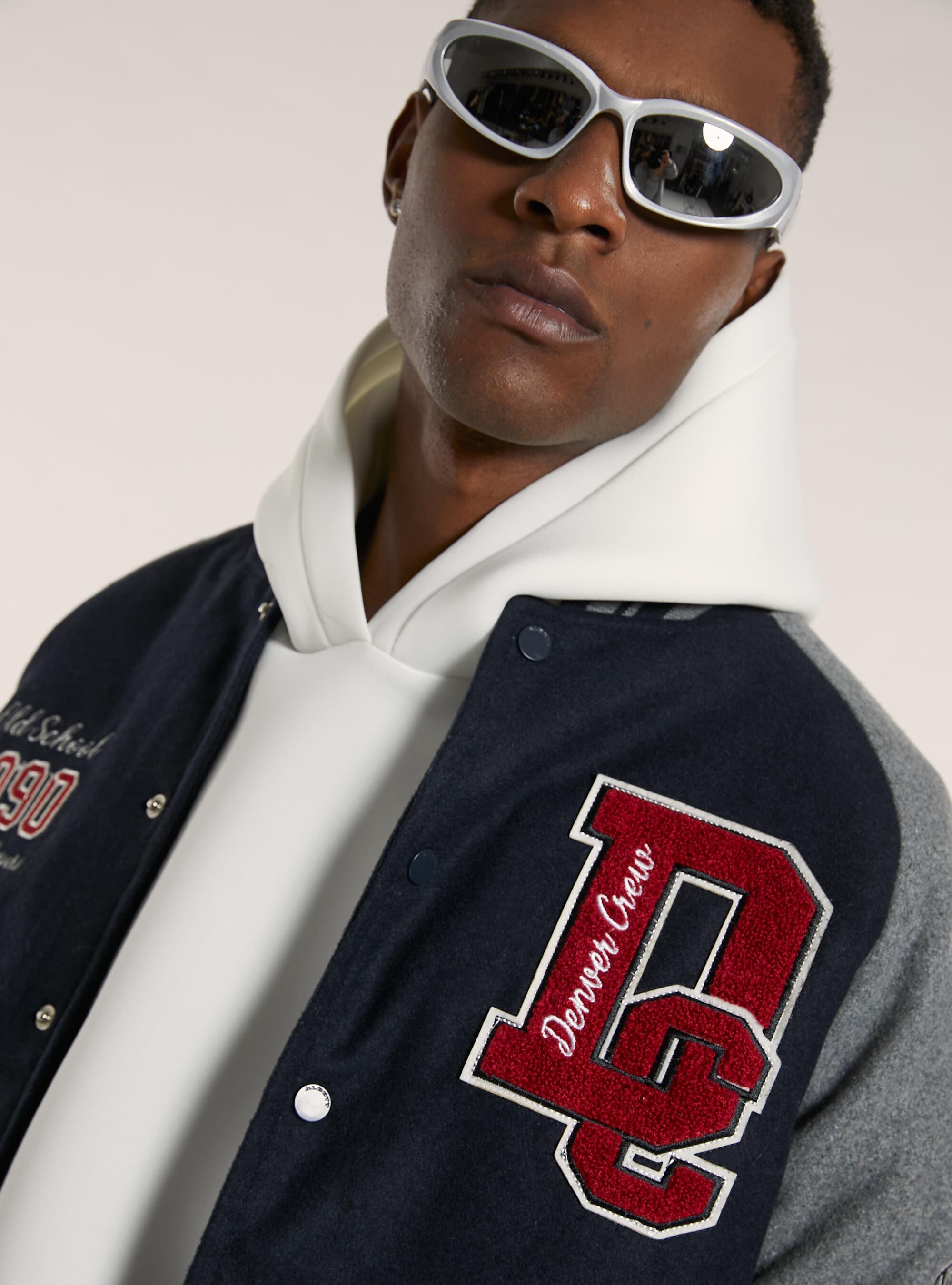 College-style bomber jacket with recycled padding