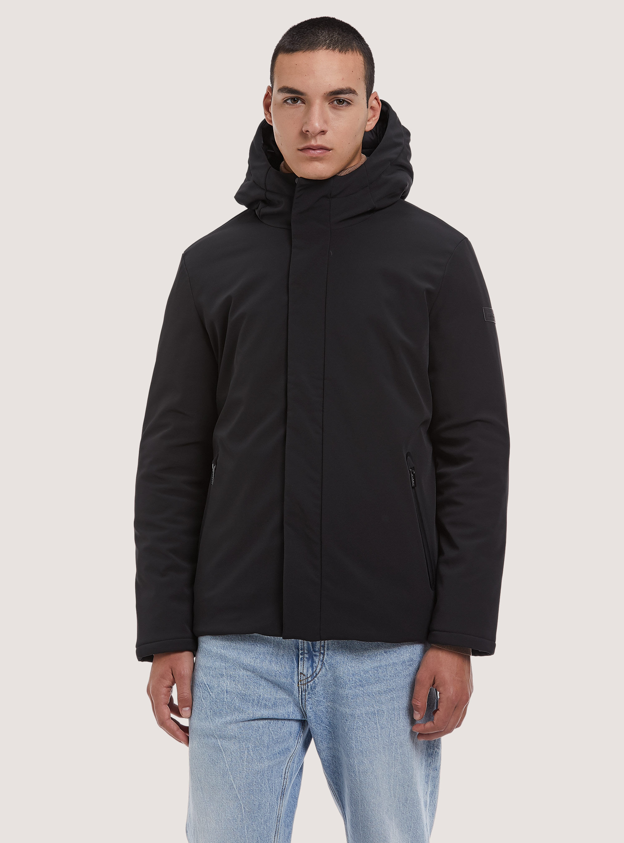 Technical fabric jacket with recycled padding