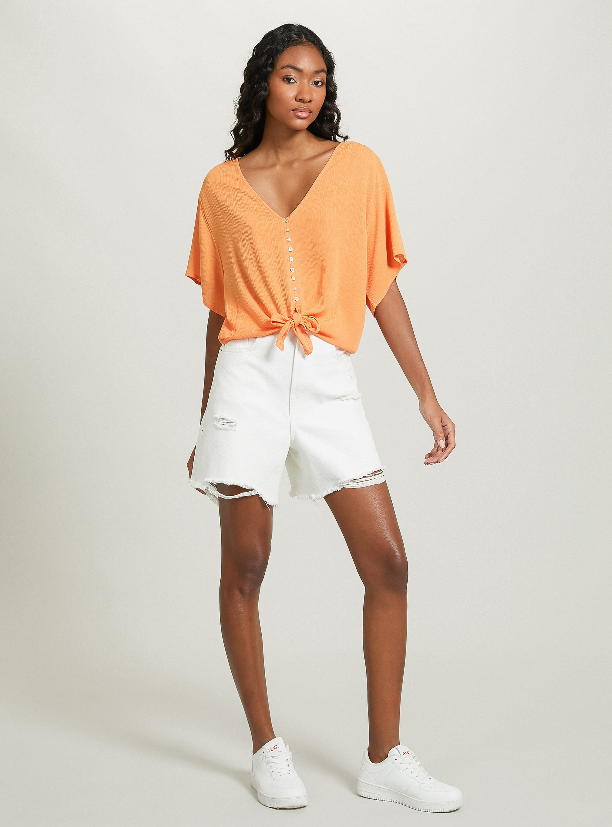 Solid colour v neck shirt with waist knot