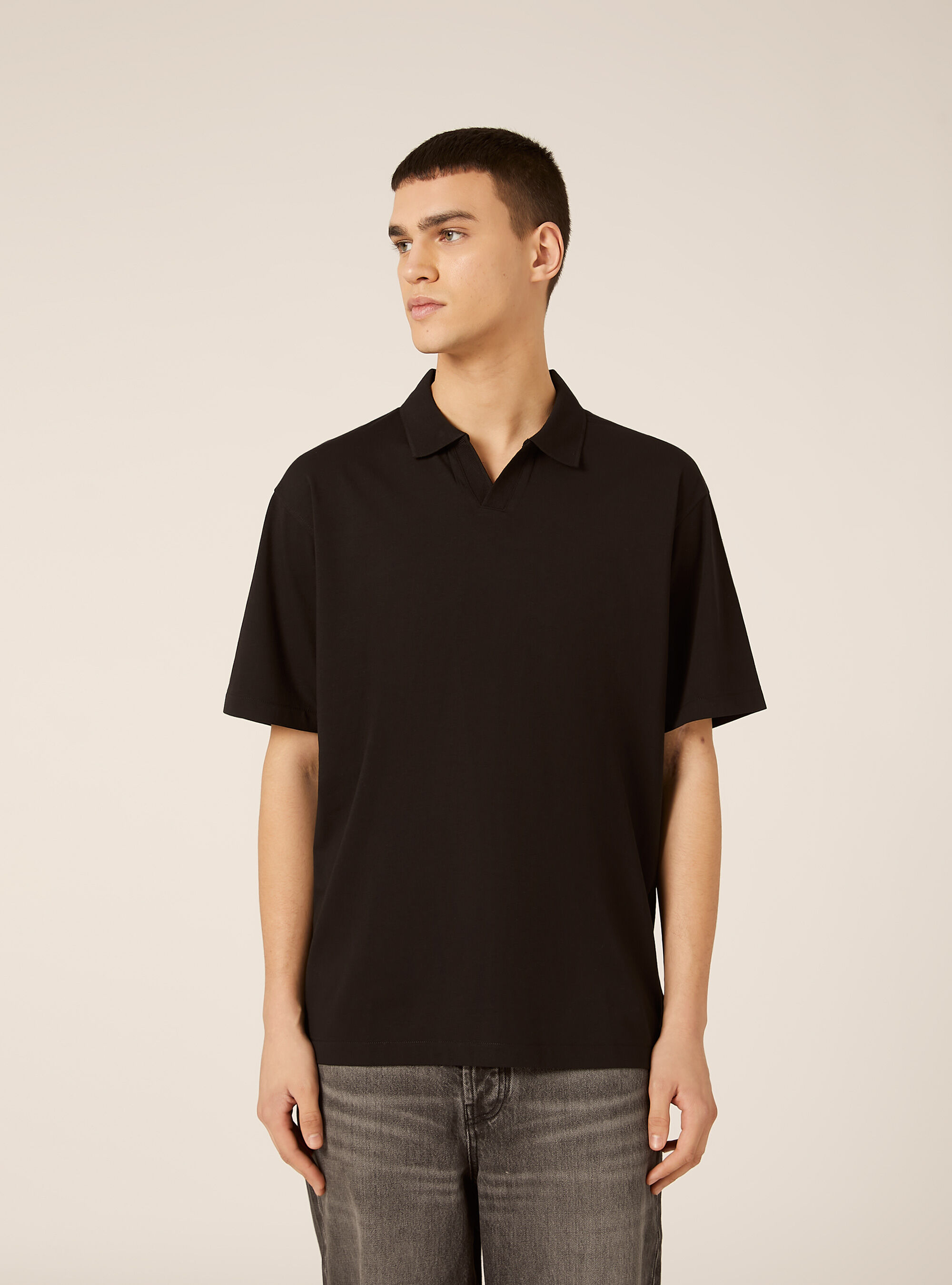 Polo mezza placchetta in jersey elasticizzato