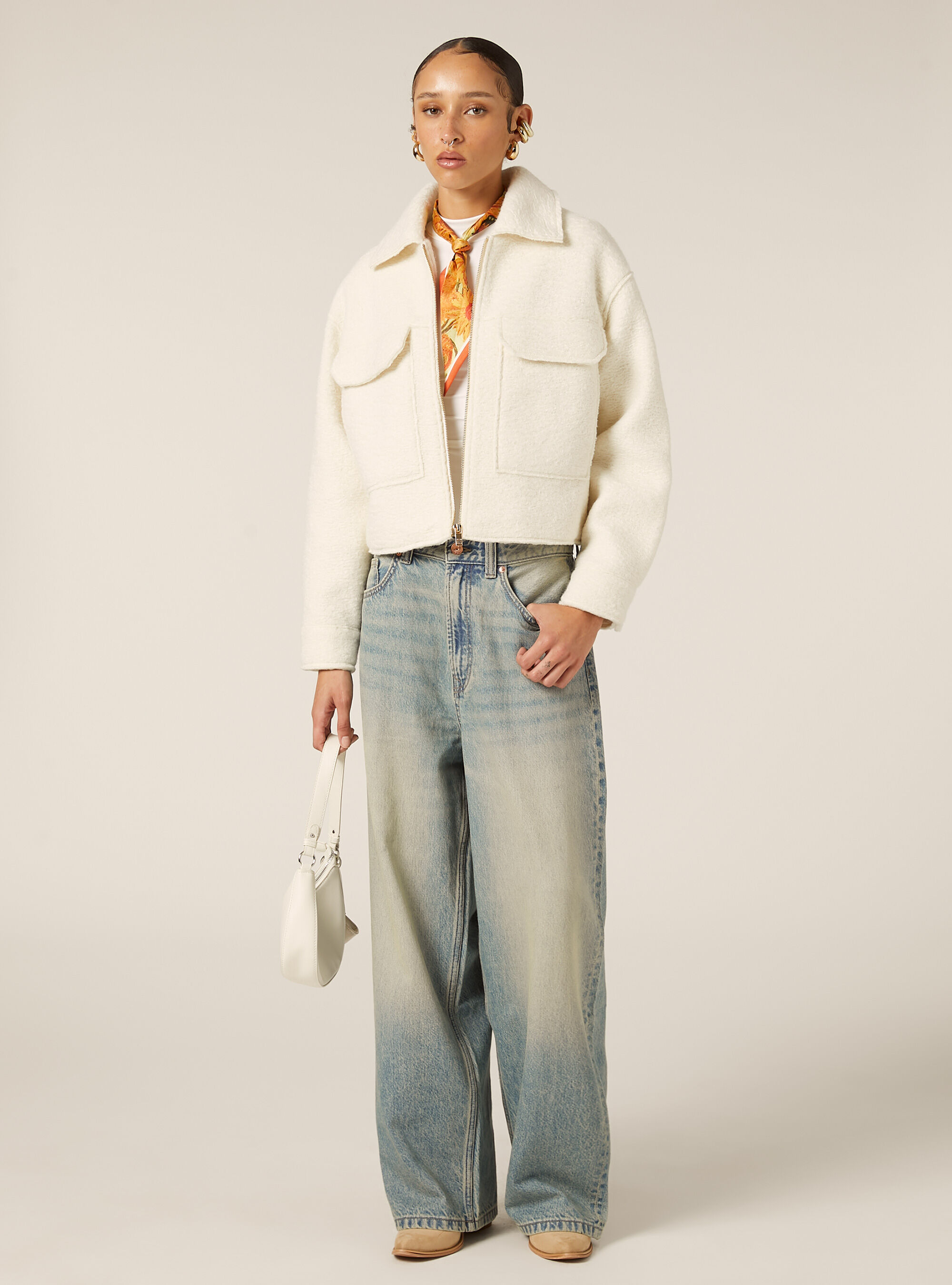 Giacca in boucl&eacute; con tasconi