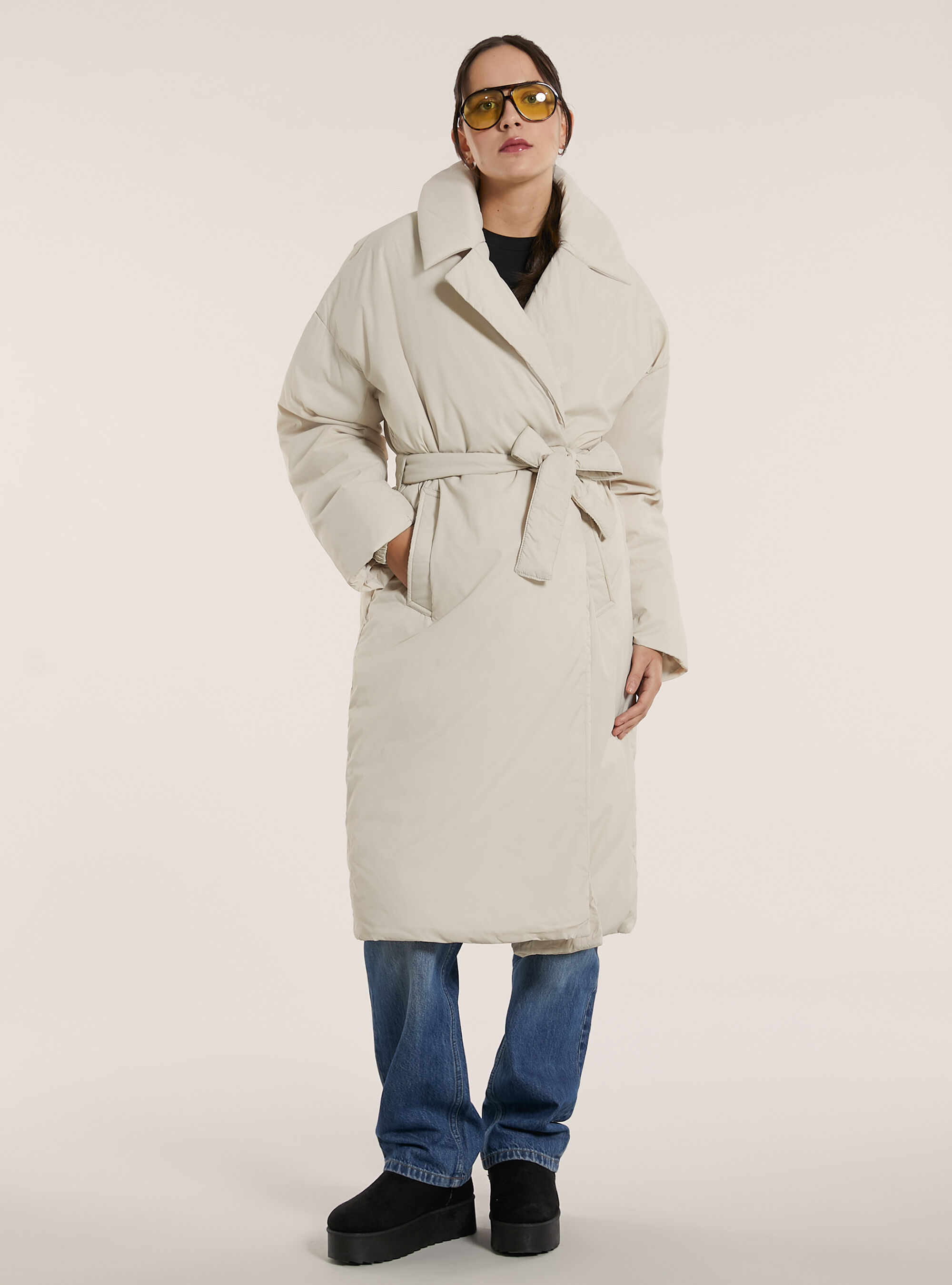 Belted trench coat with recycled padding