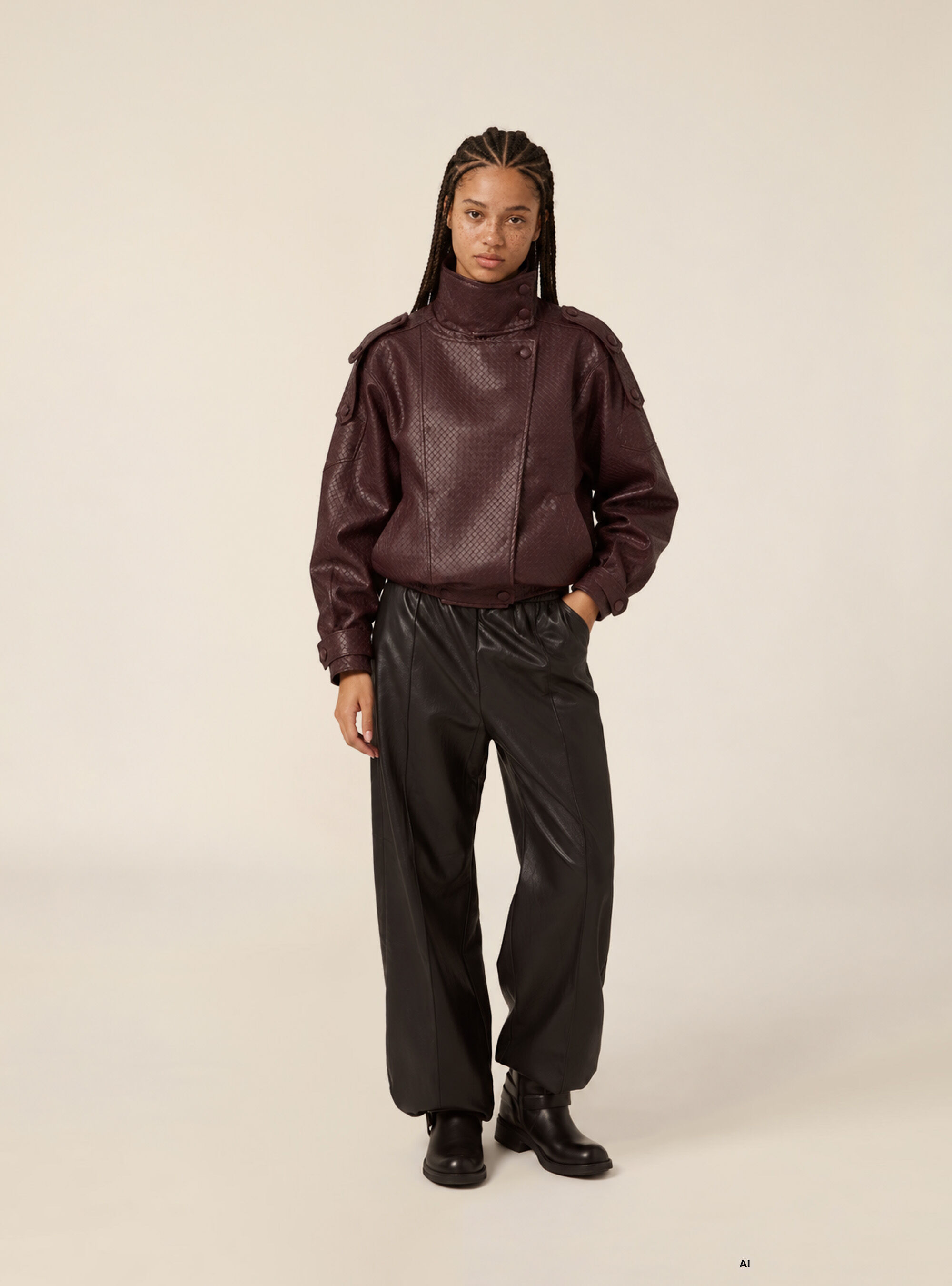 Blouson bomber effet cuir tress&eacute;
