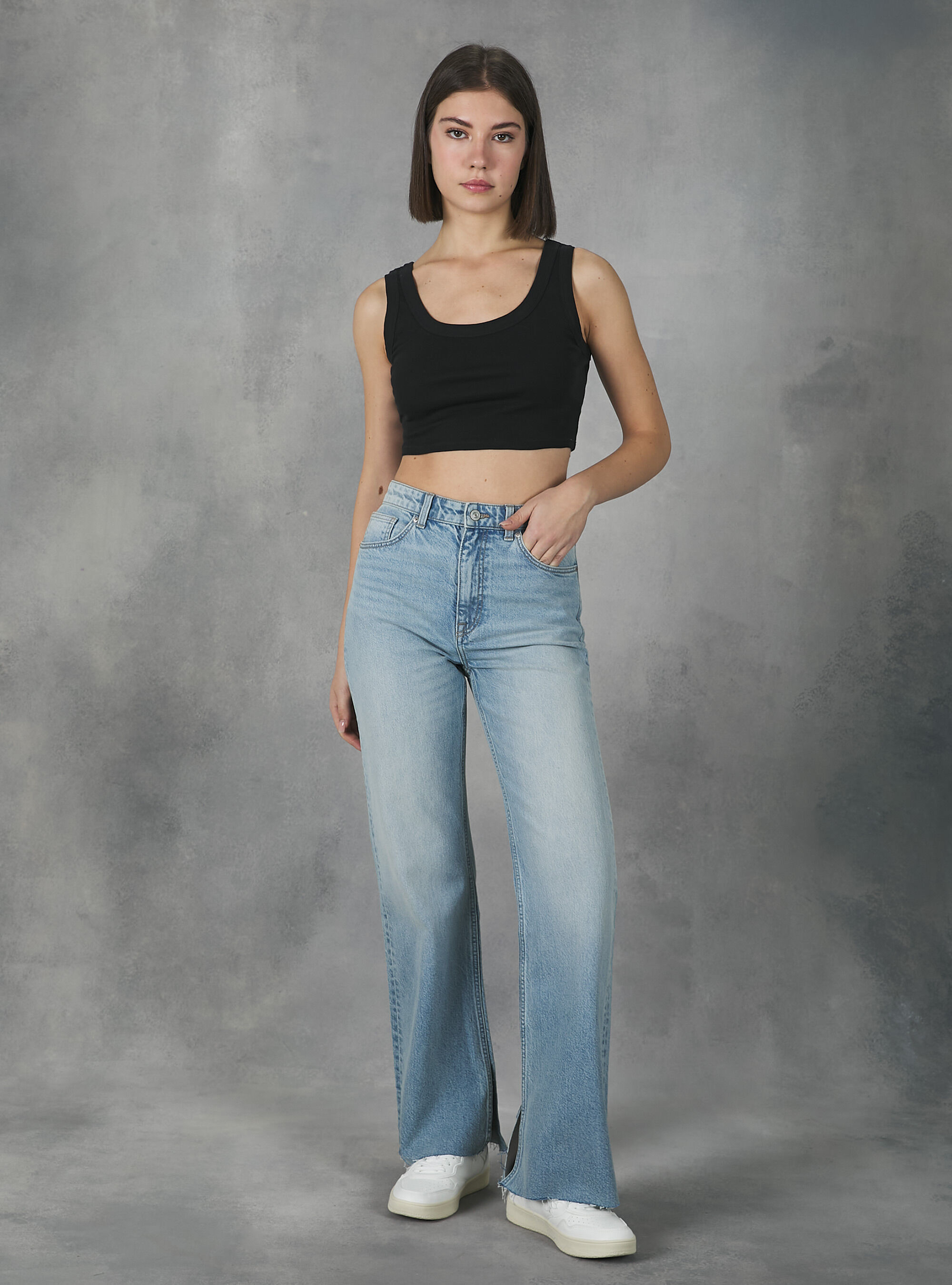 Jeans avec fente new arrivals