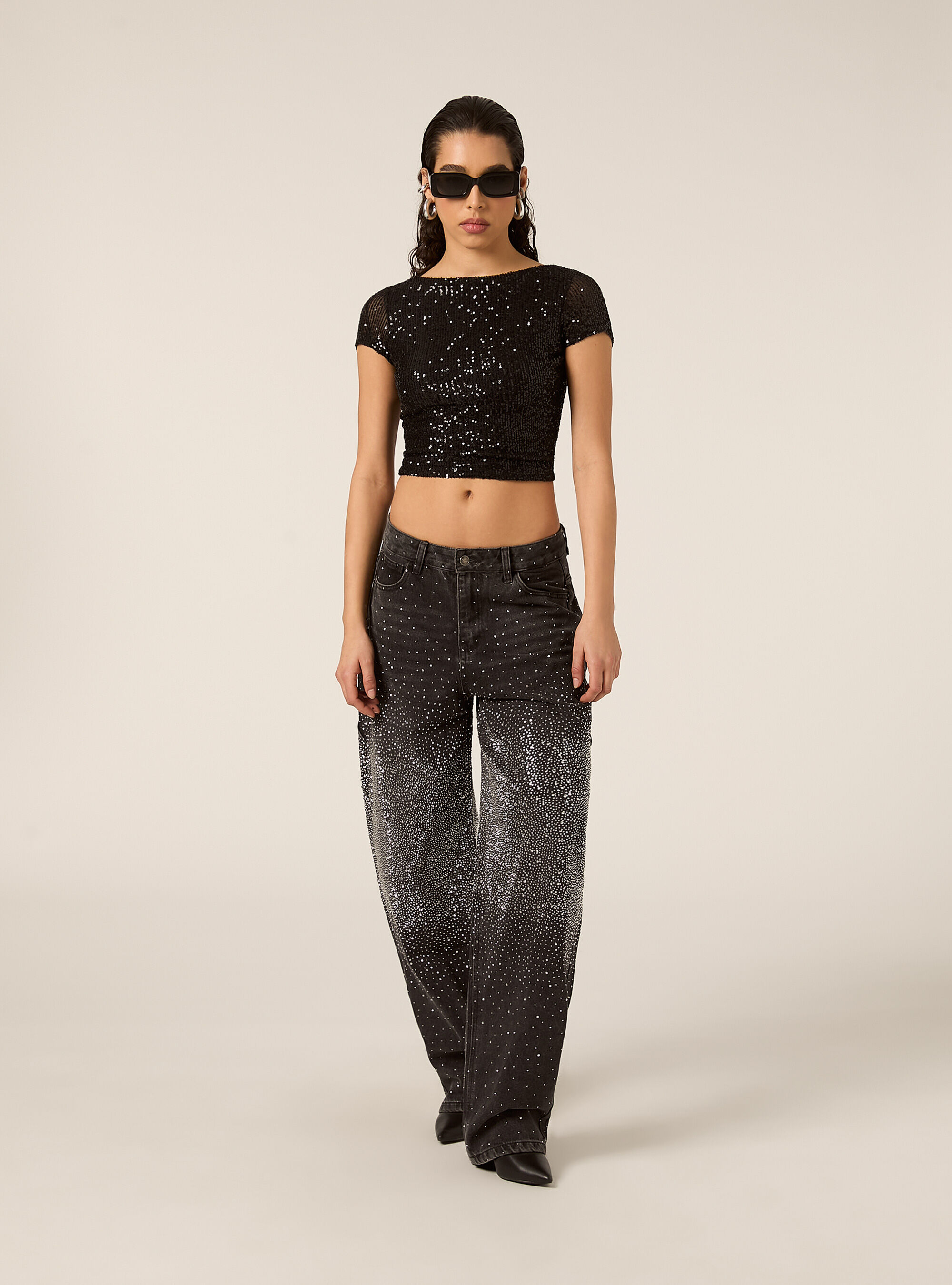 T-shirt schiena scoperta in paillettes