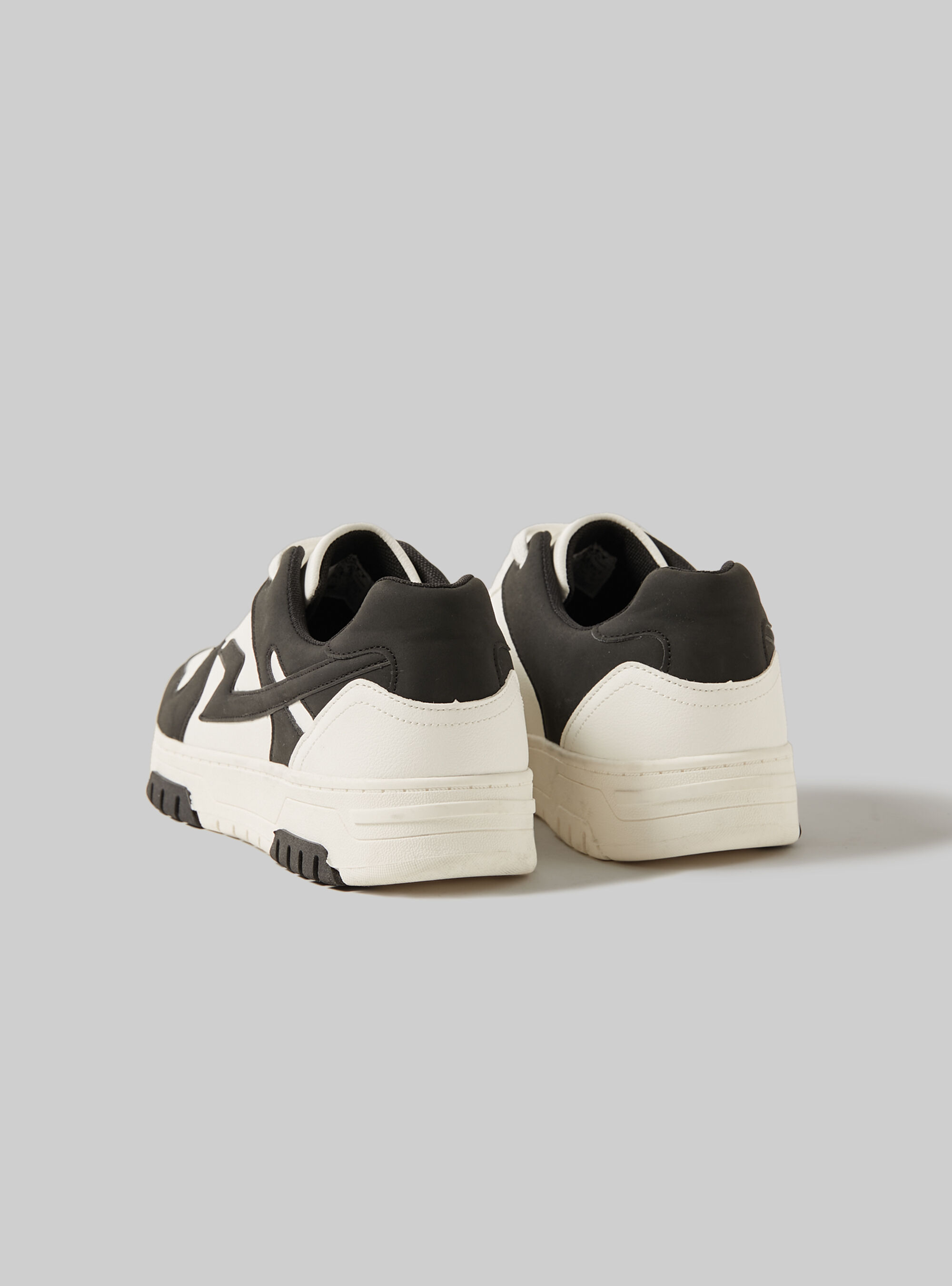 Sneakers with lightning shop bolt on side