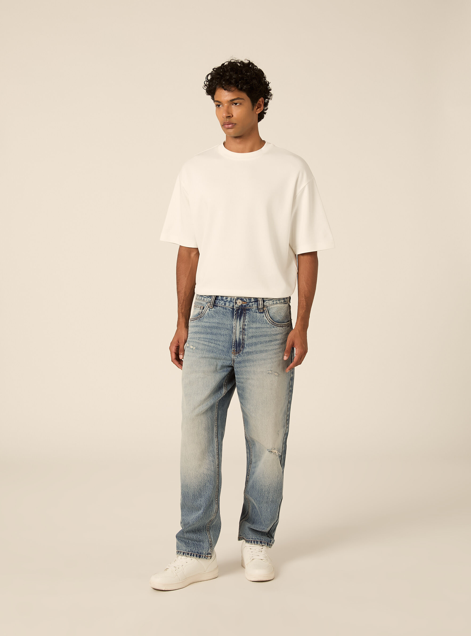 Pantalone in denim tapered fit