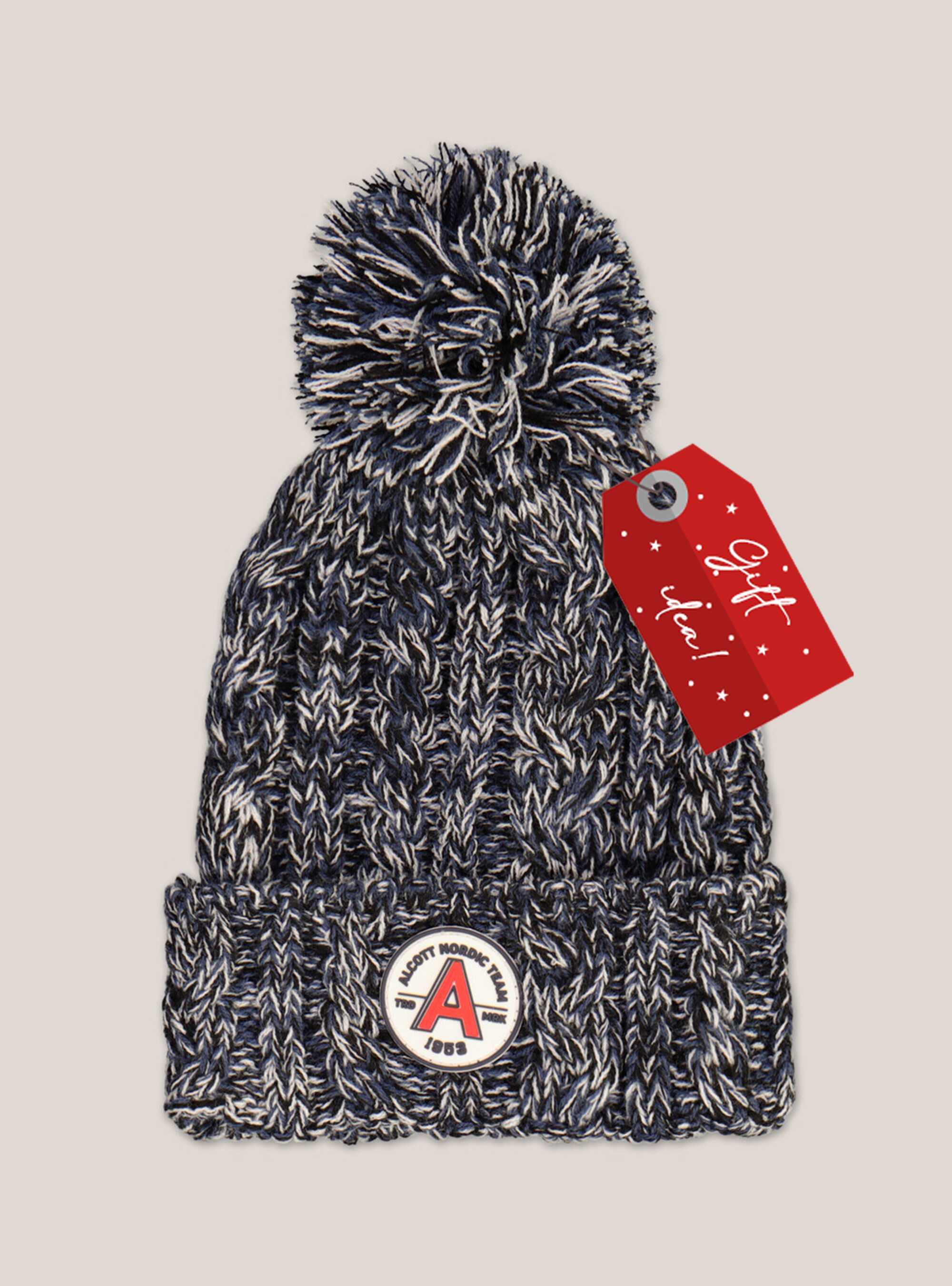 Hat with pom-pom and patch