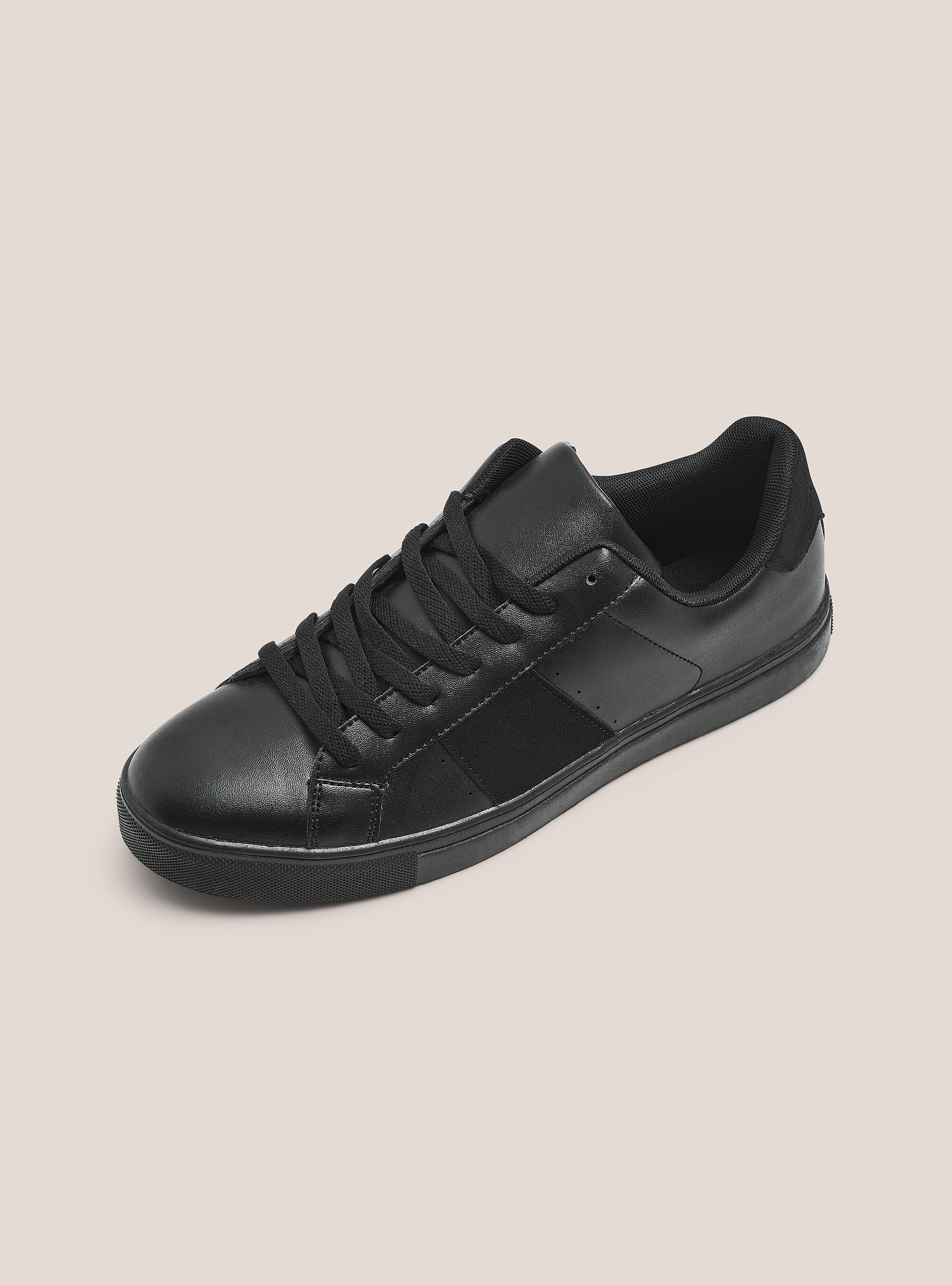 White sneaker with black band hot sale