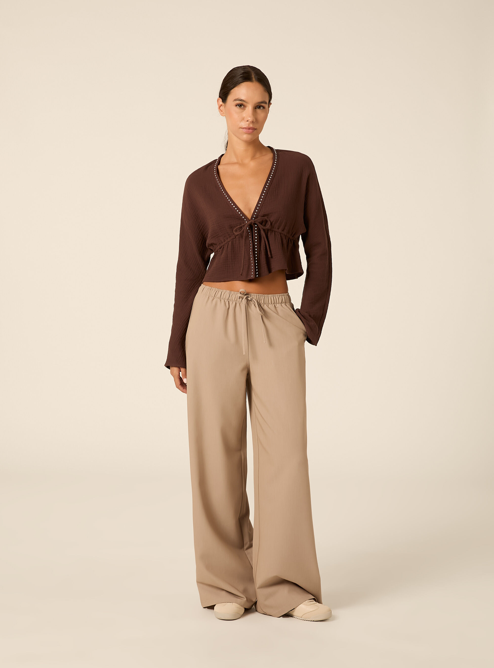 Blusa con borchie