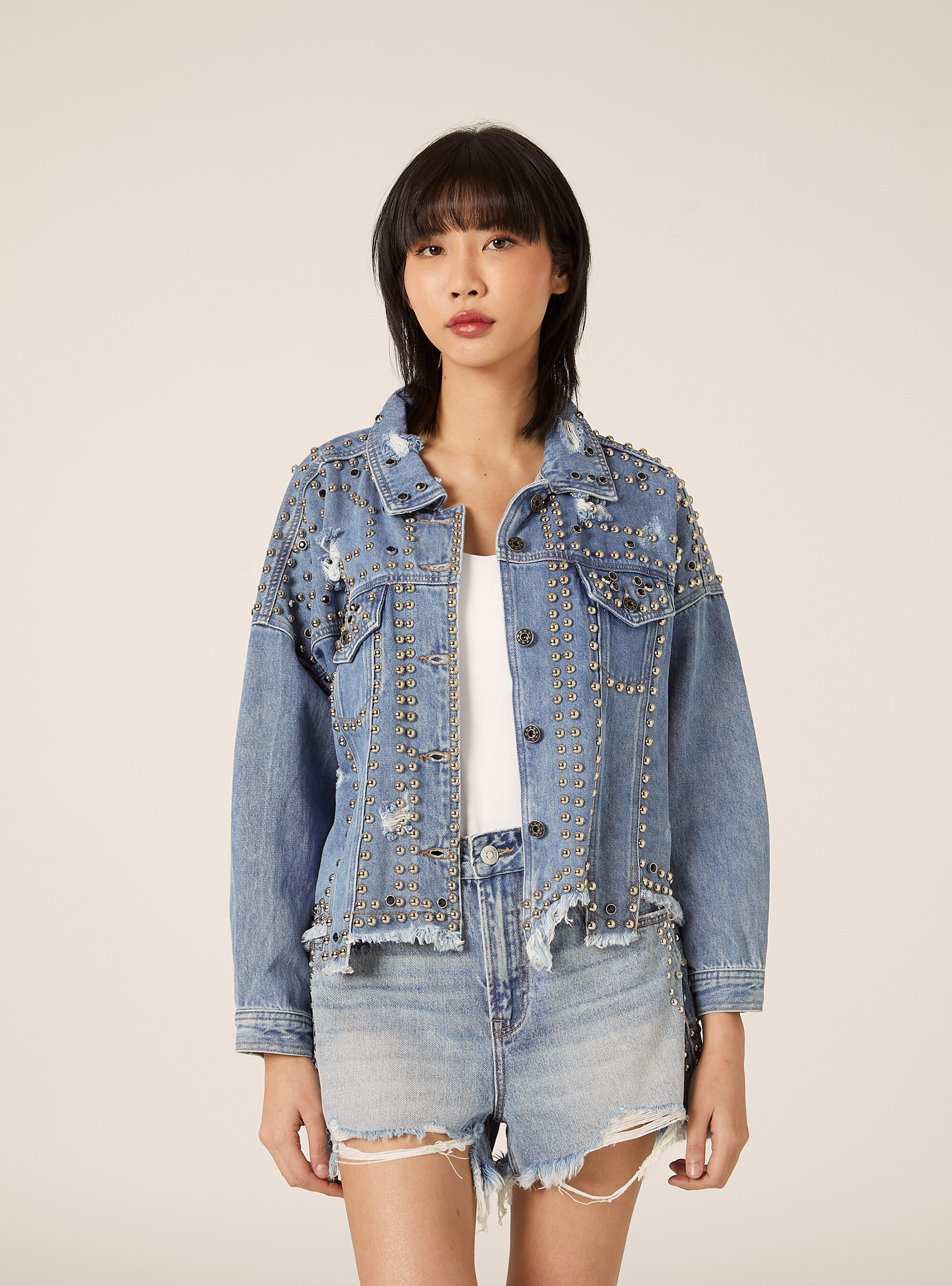 Giacca in denim con borchie