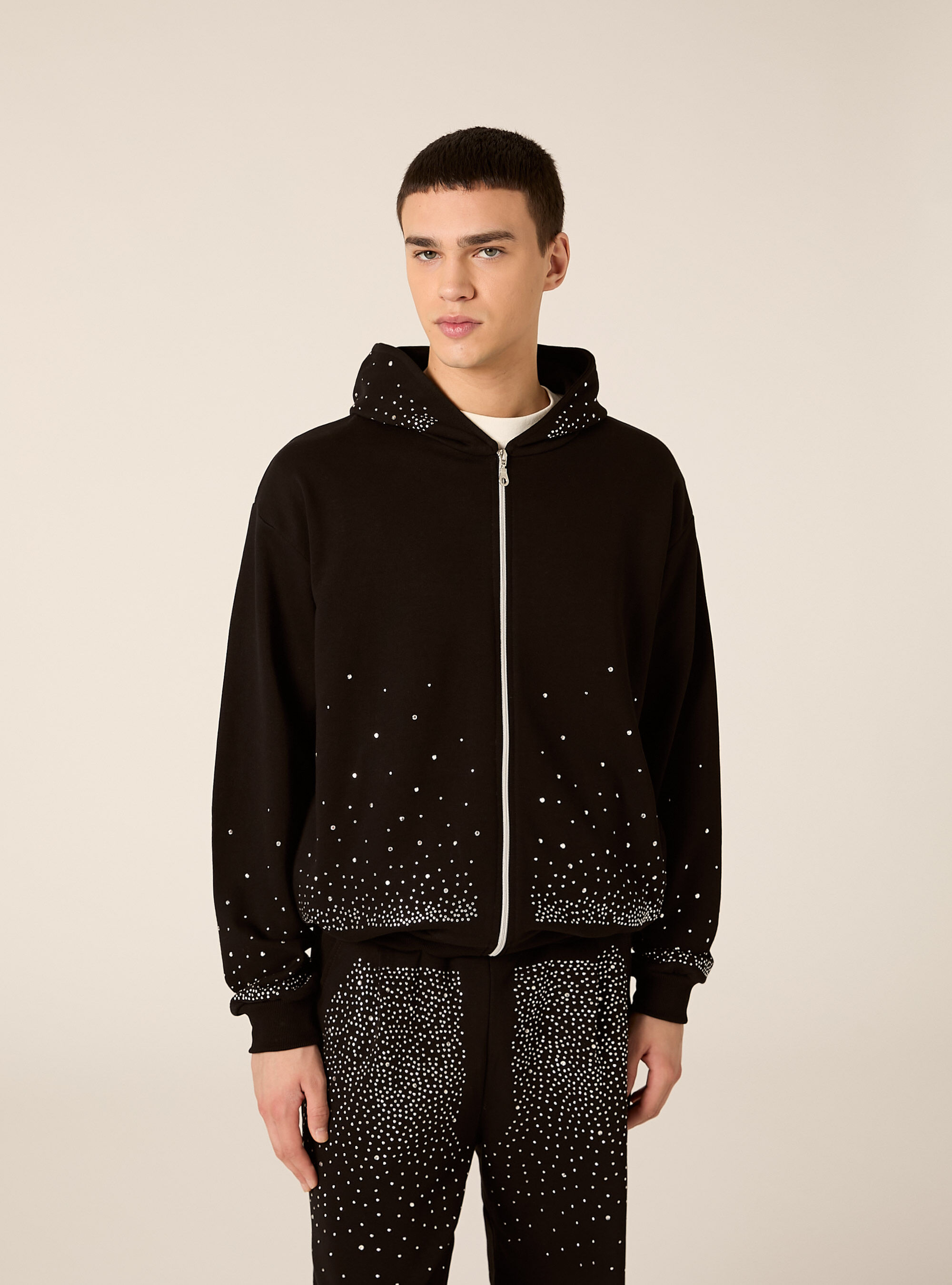 Boxy fit sweatshirt with rhinestones