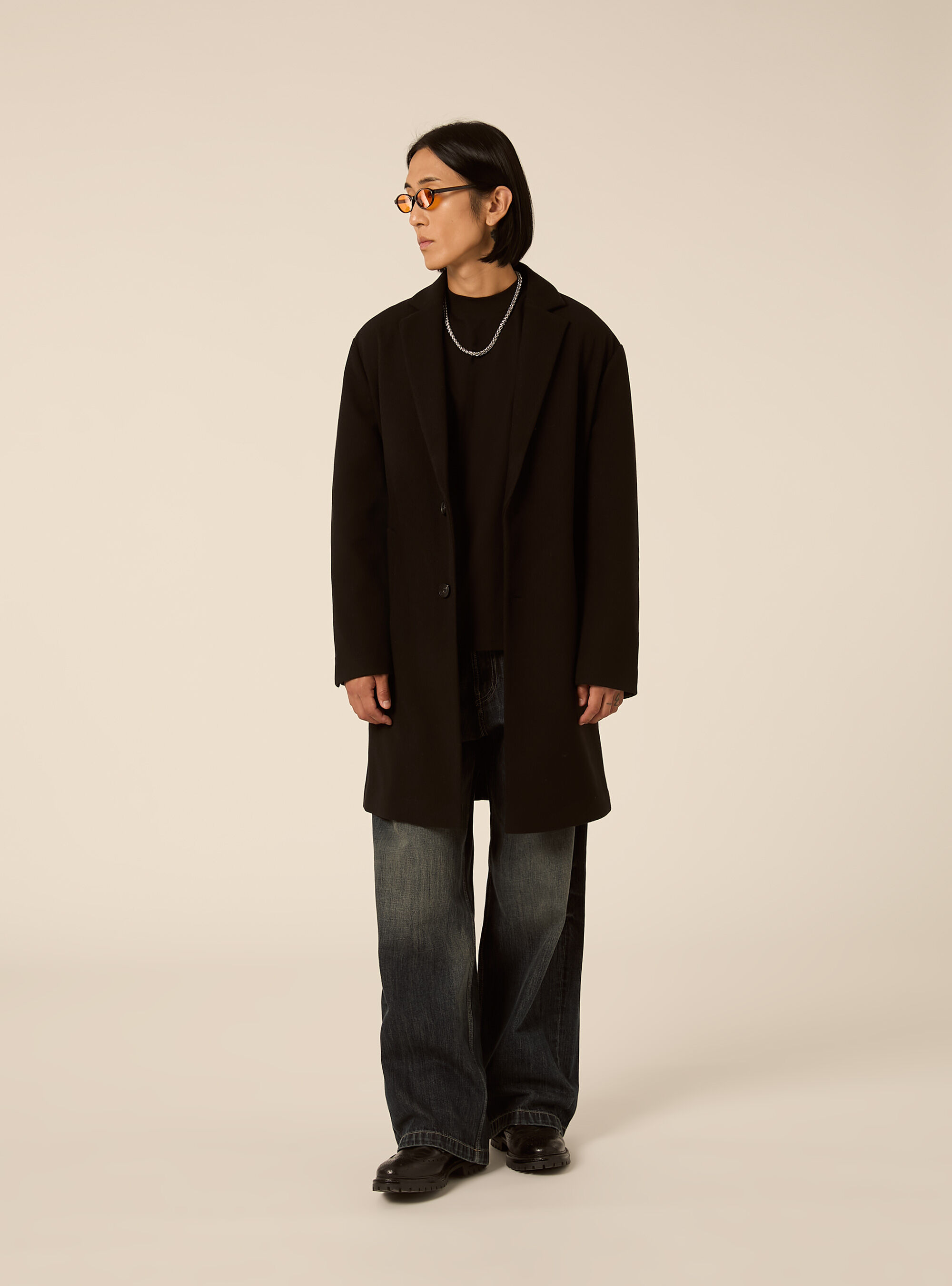 Unlined single breasted coat with lapels