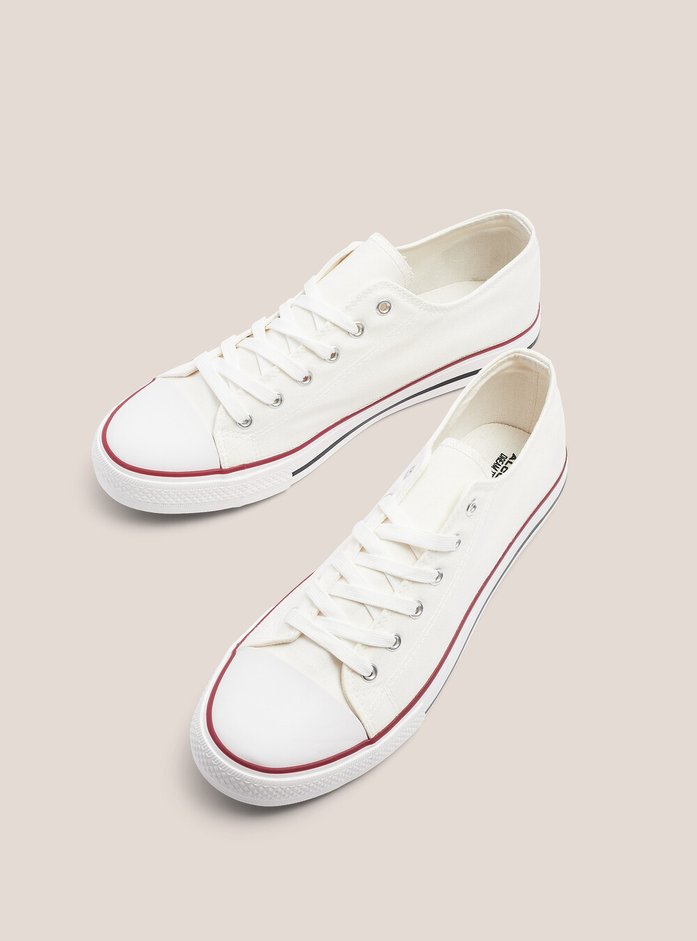 Low trainers in light fabric