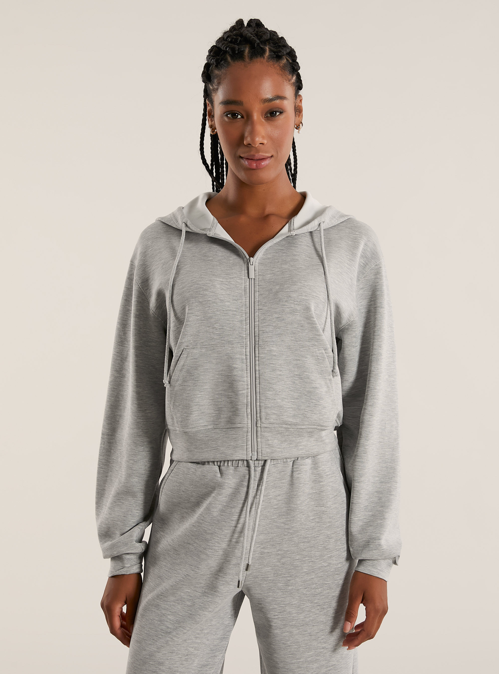 Cardigan con zip cappuccio soft touch