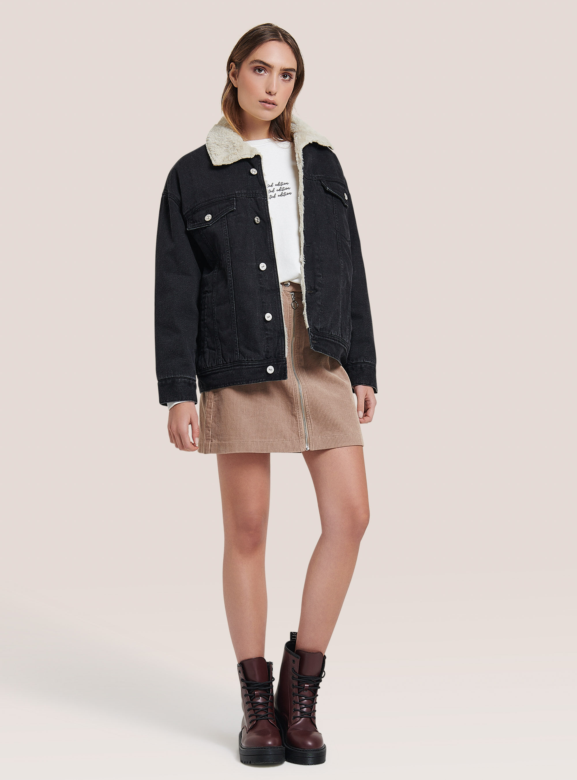 Denim jacket with faux fur lining and collar