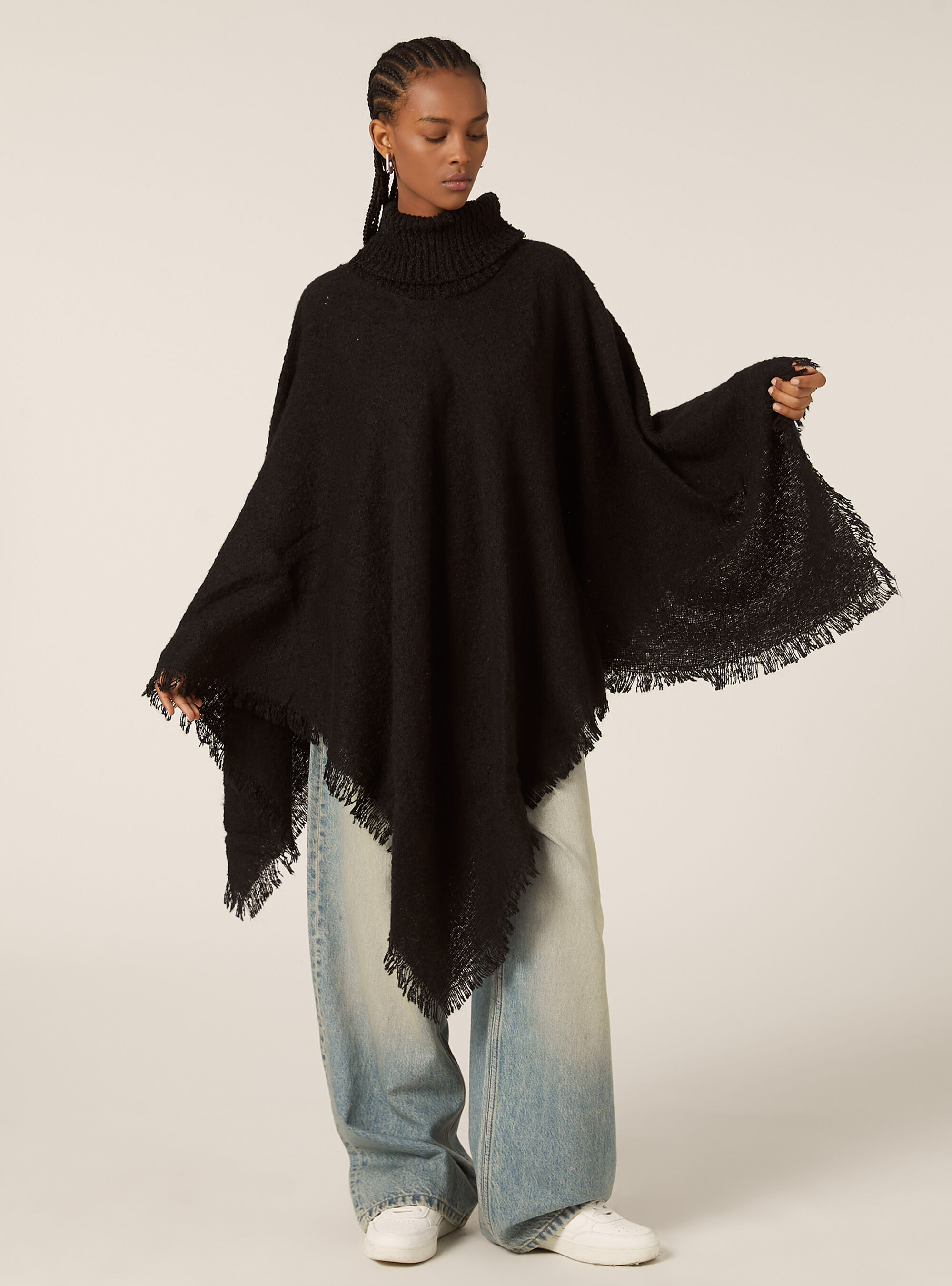 Poncho suave al tacto con cuello alto