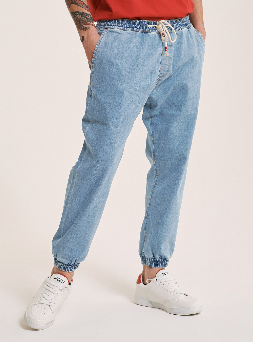Stretch denim jogger trousers with elasticated waistband