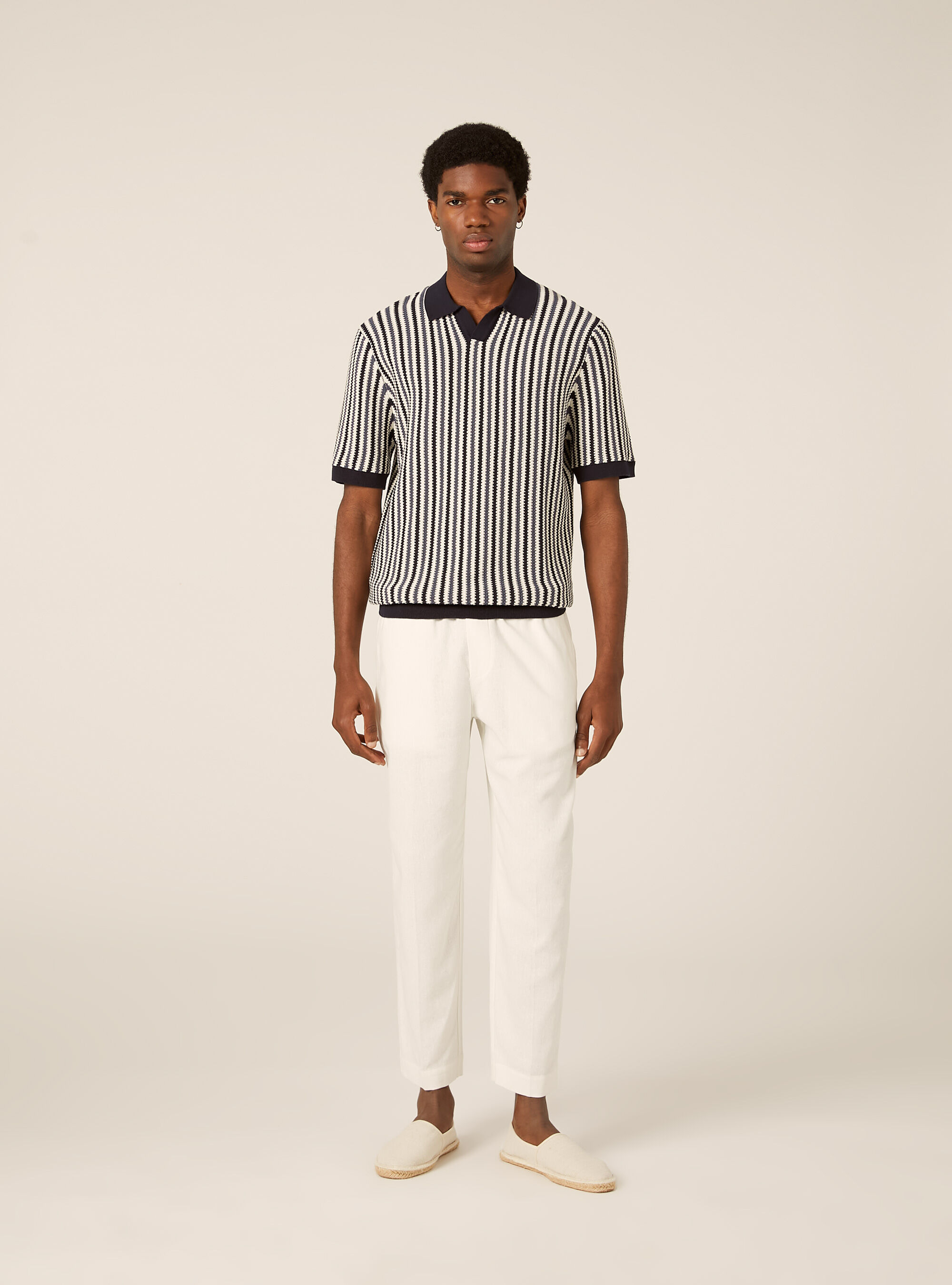 Polo en maille ray&eacute;e