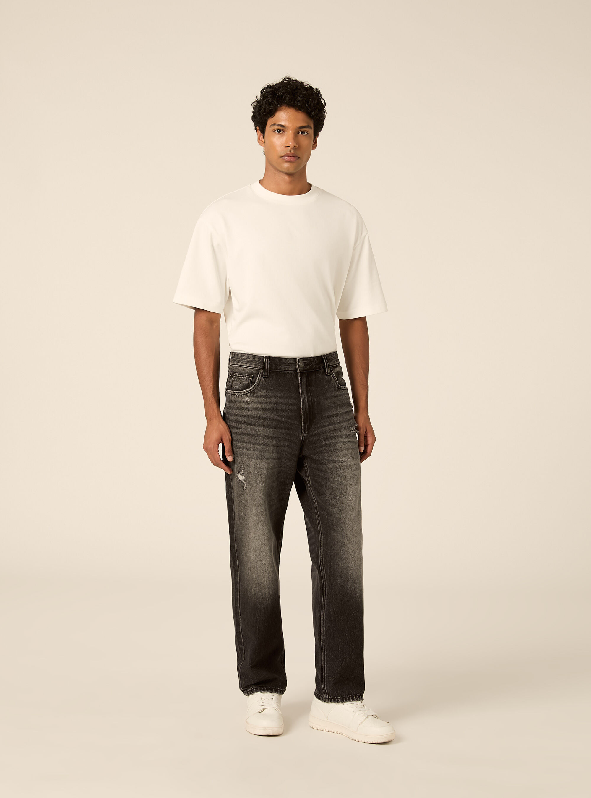 Pantalone in denim tapered fit