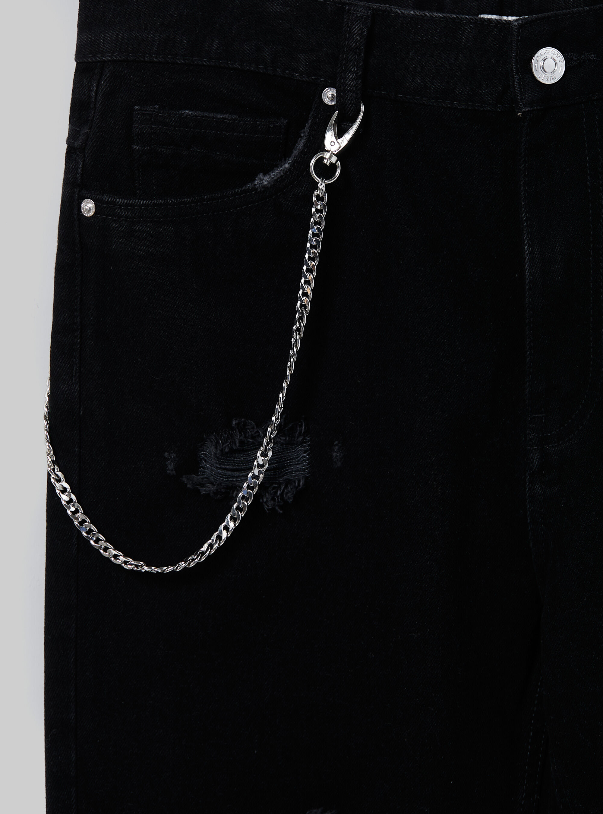 Jeans relax fit con catena