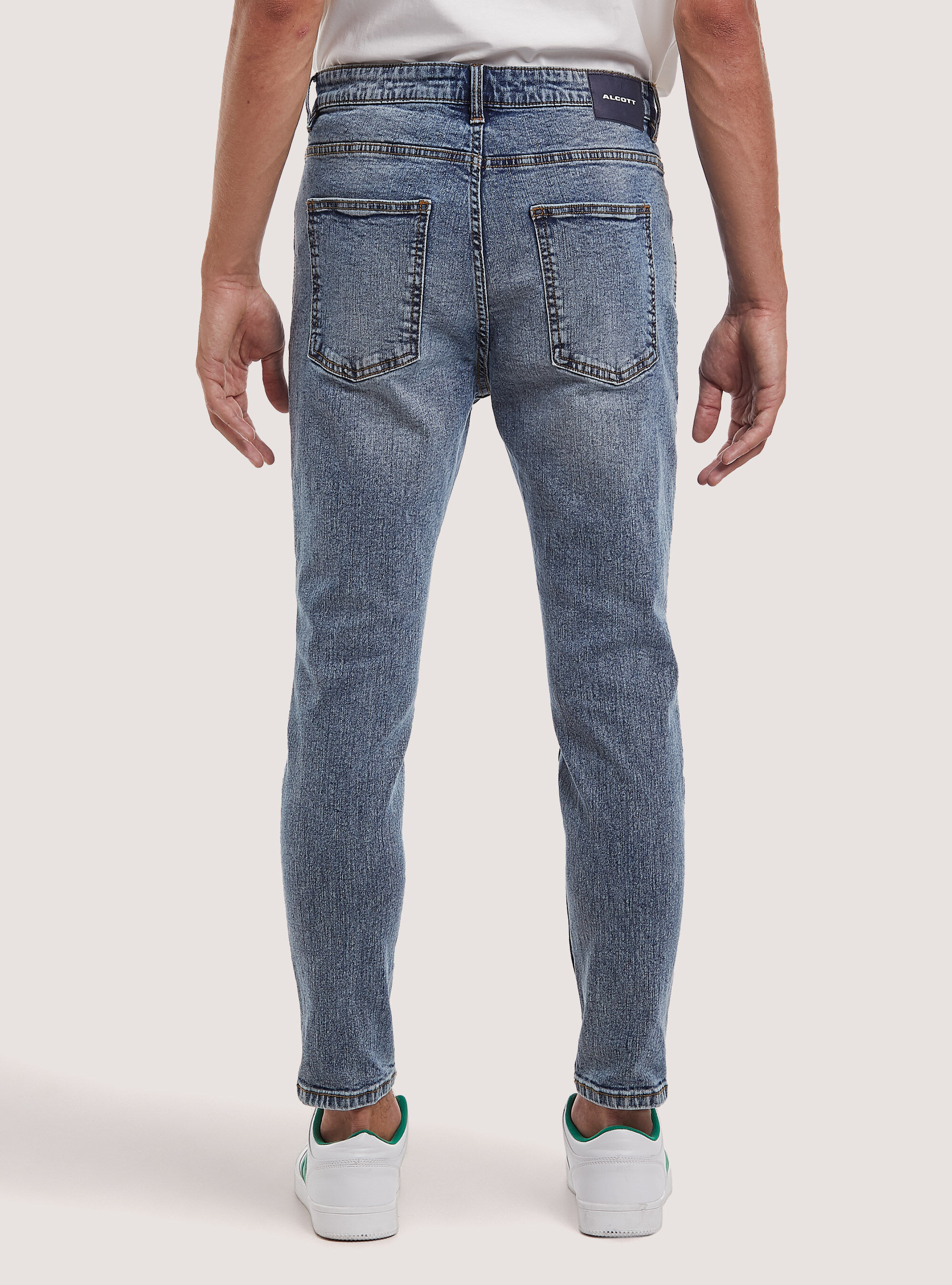 Jeans carrot fit uomo significato store