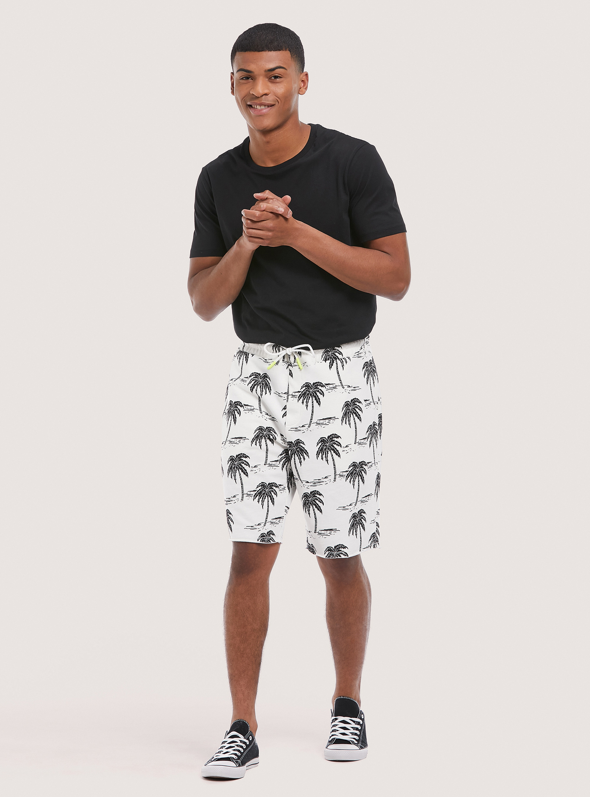 Cotton jogger bermuda shorts with print 