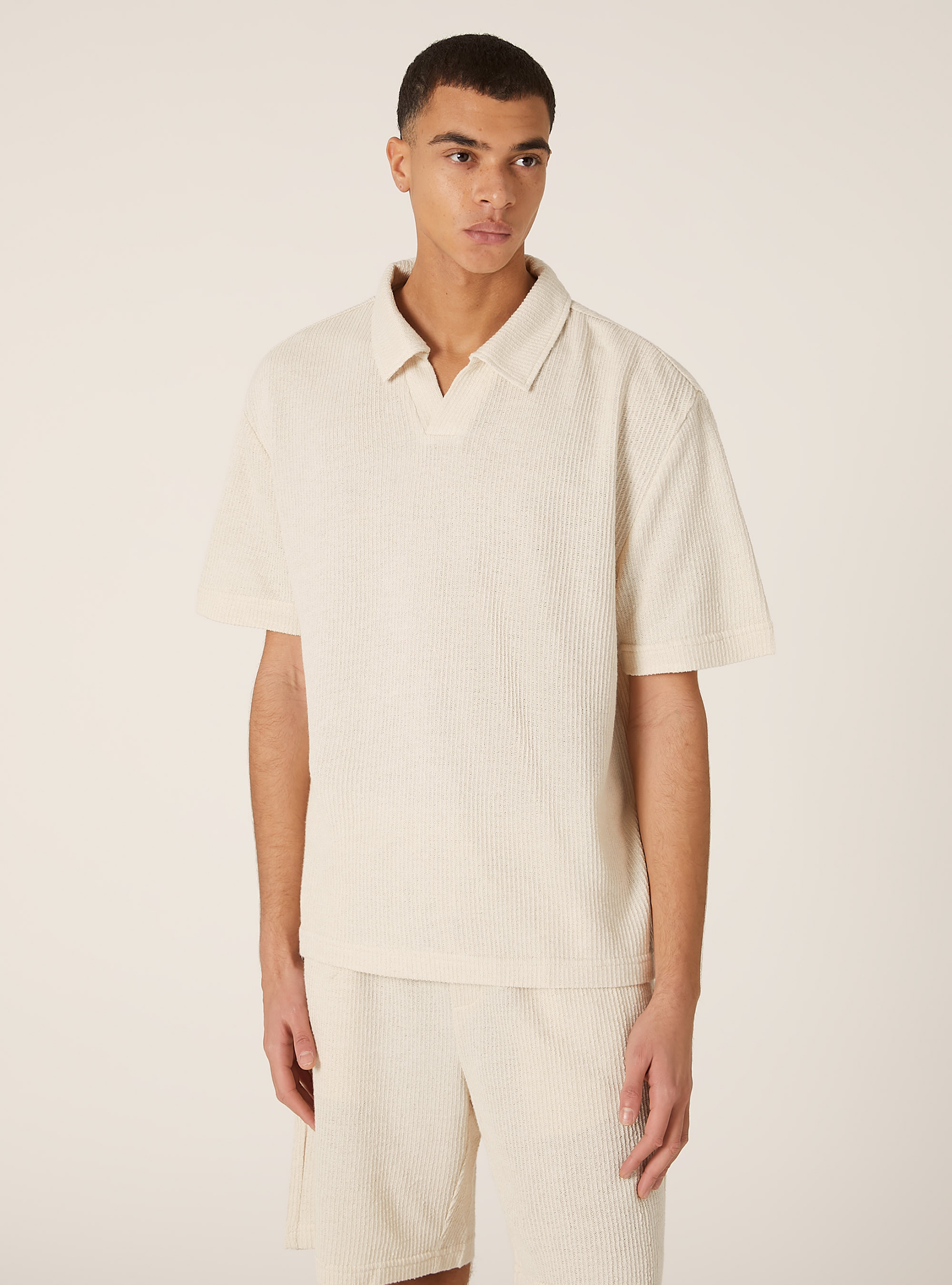 Textured knit polo shirt