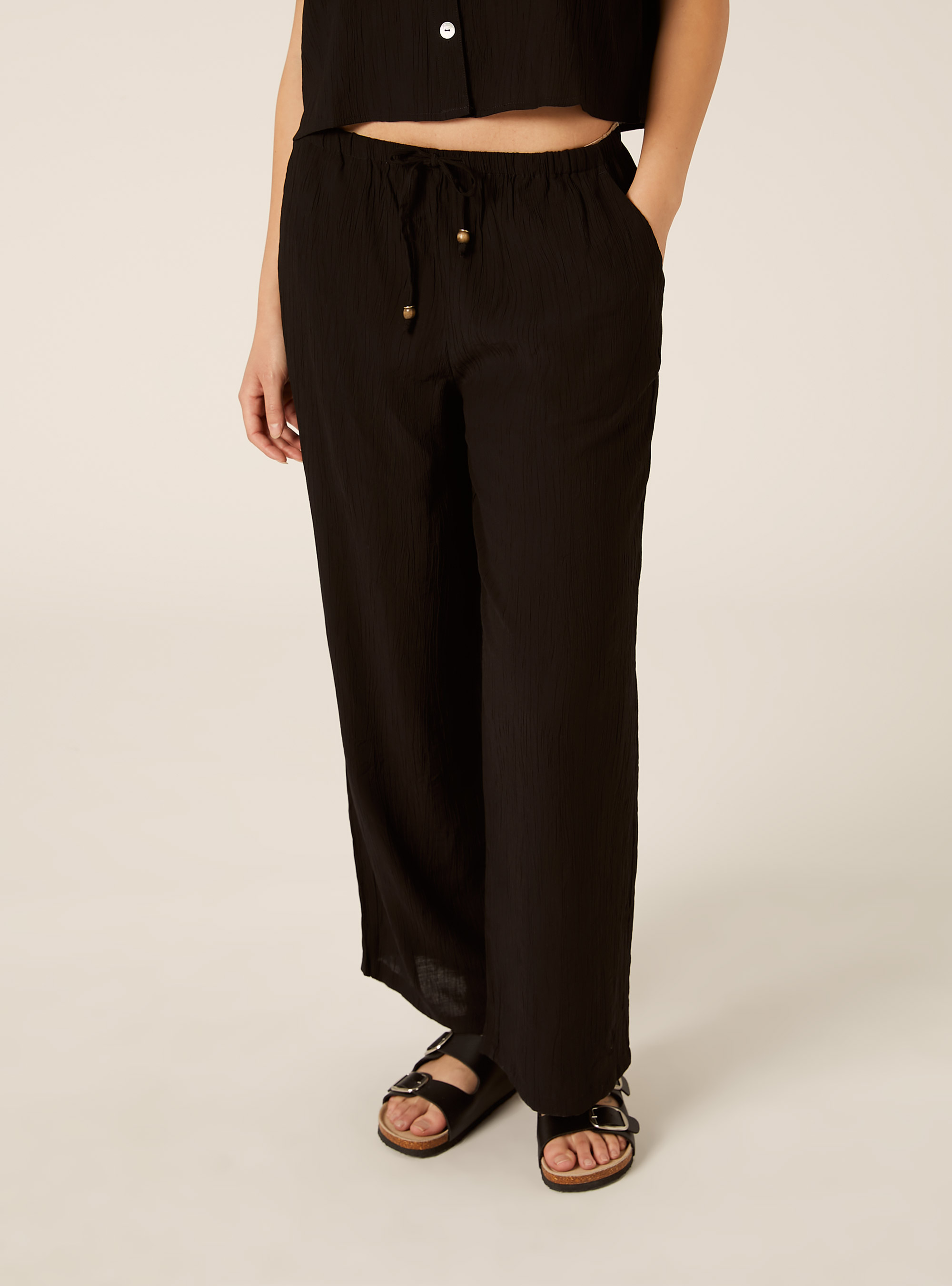 Pantaloni ampi con vita elasticizzata in crepe, NERO