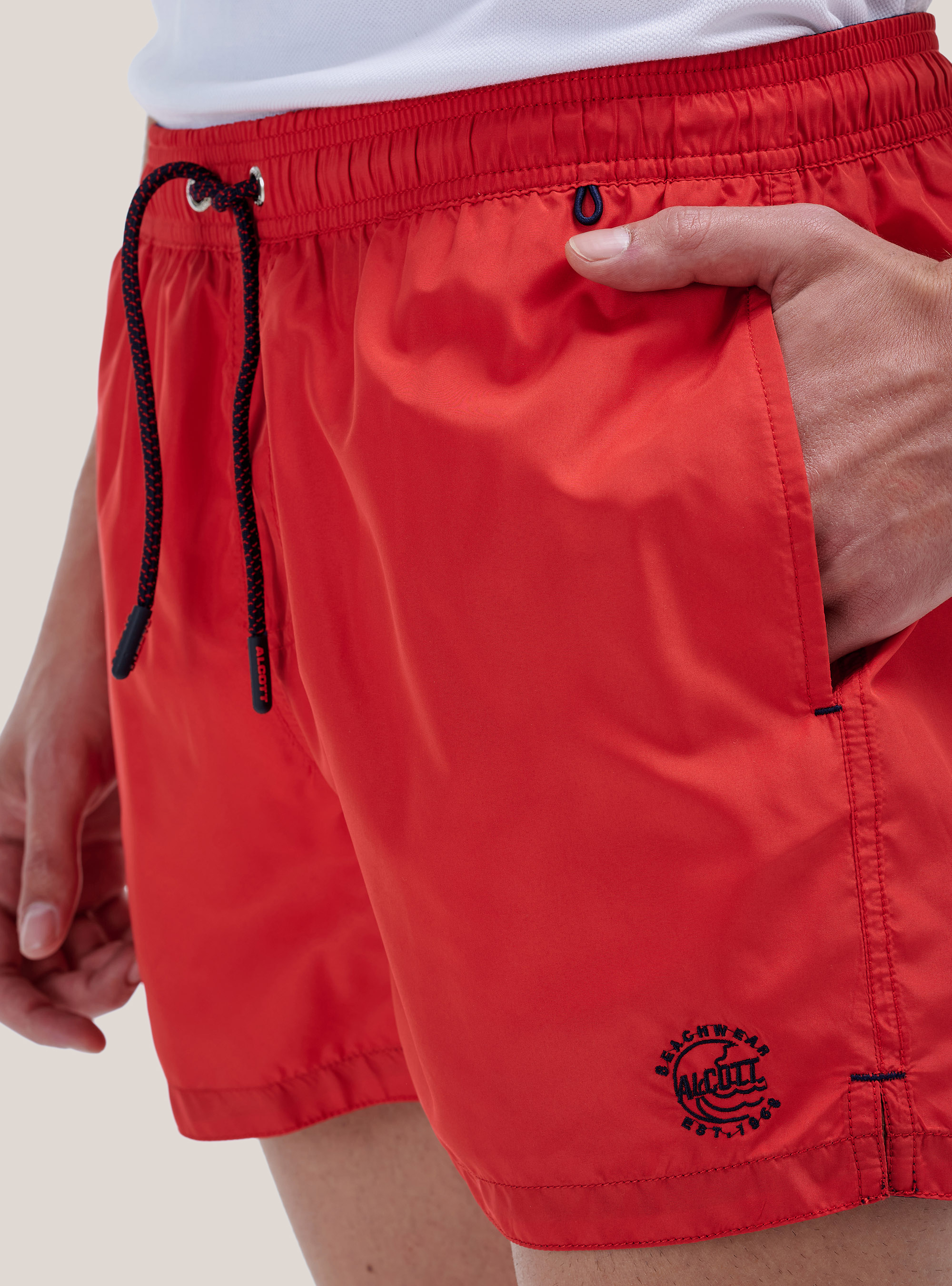 Color solid swimsuit with front embroidery and back pocket., RED