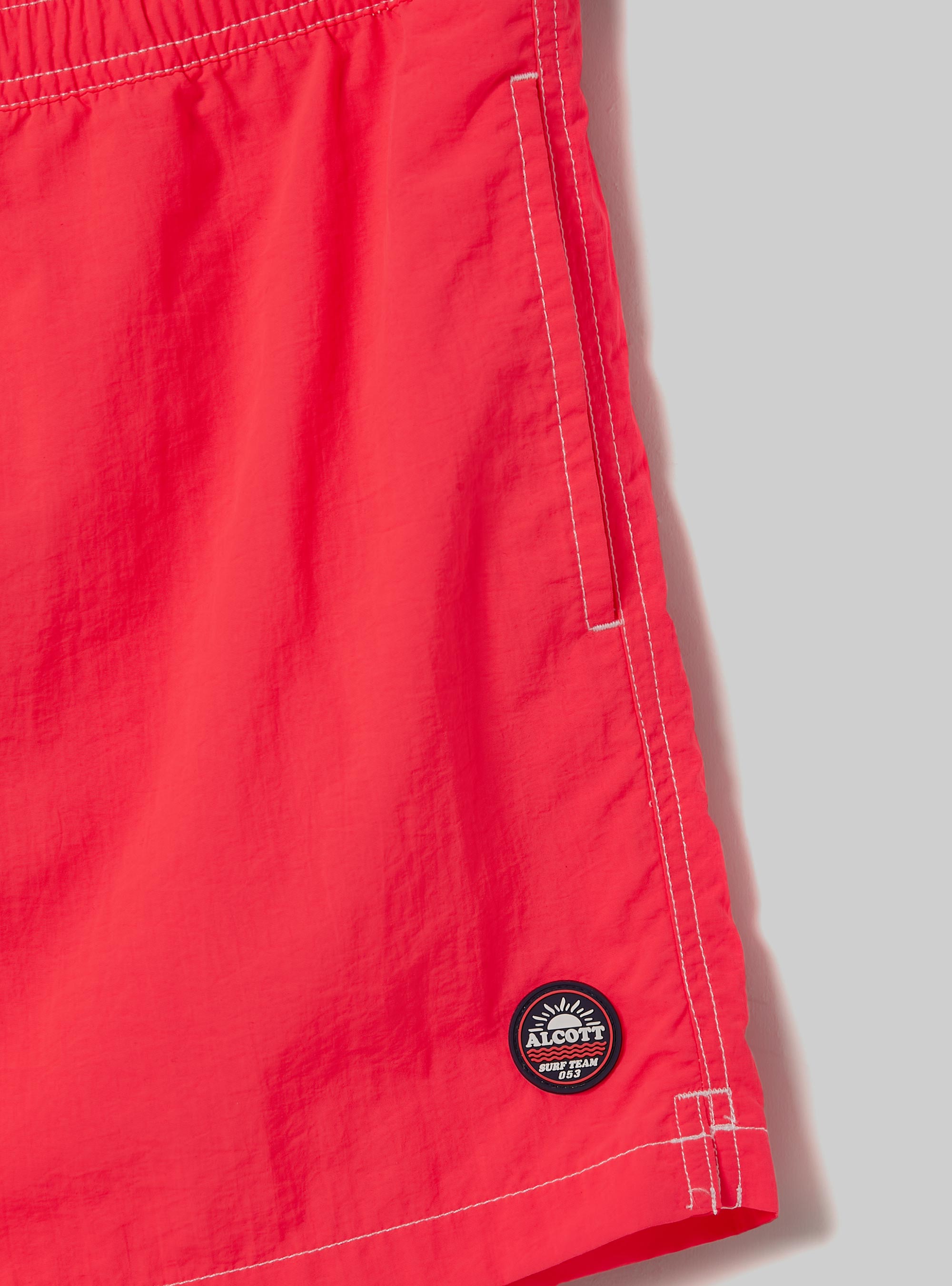 Plain-coloured swimming costume with embroidery and back pocket, FCL2 CORAL MEDIUM FLUO