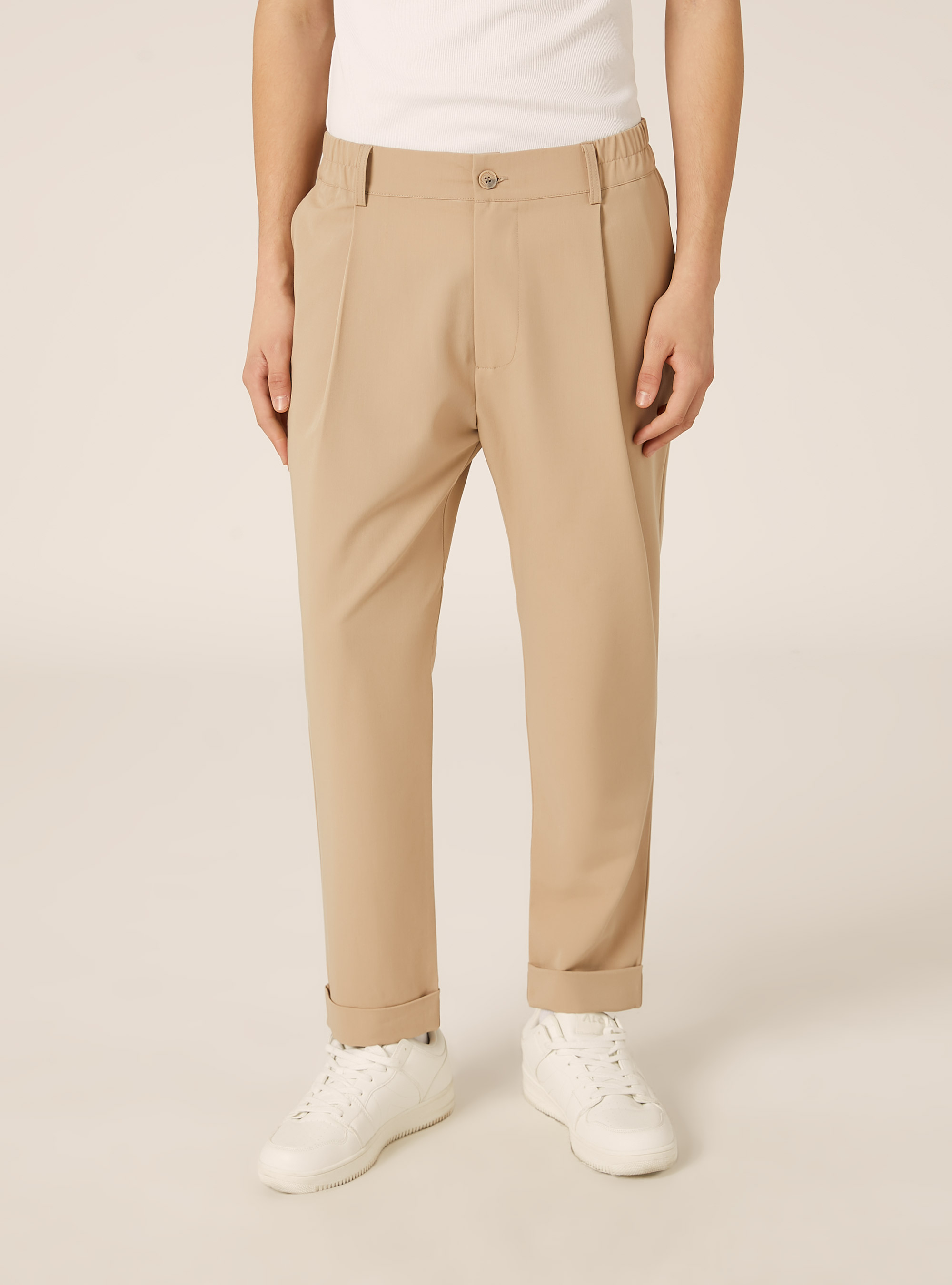 Pantalones carrot fit con pinzas | Alcott | Pantalones Uomo